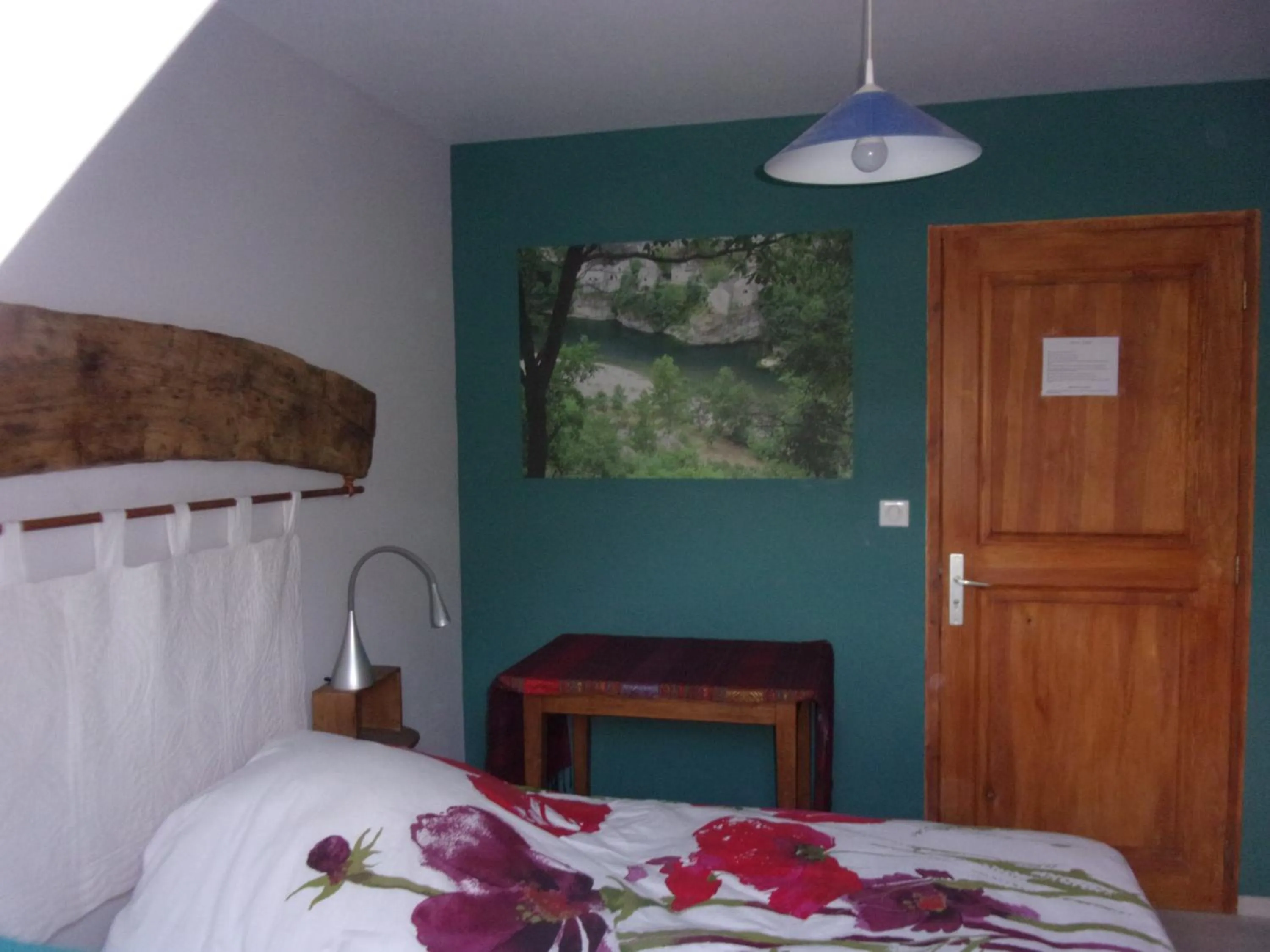 Bed in Chambre d'hôtes Le Cascadou