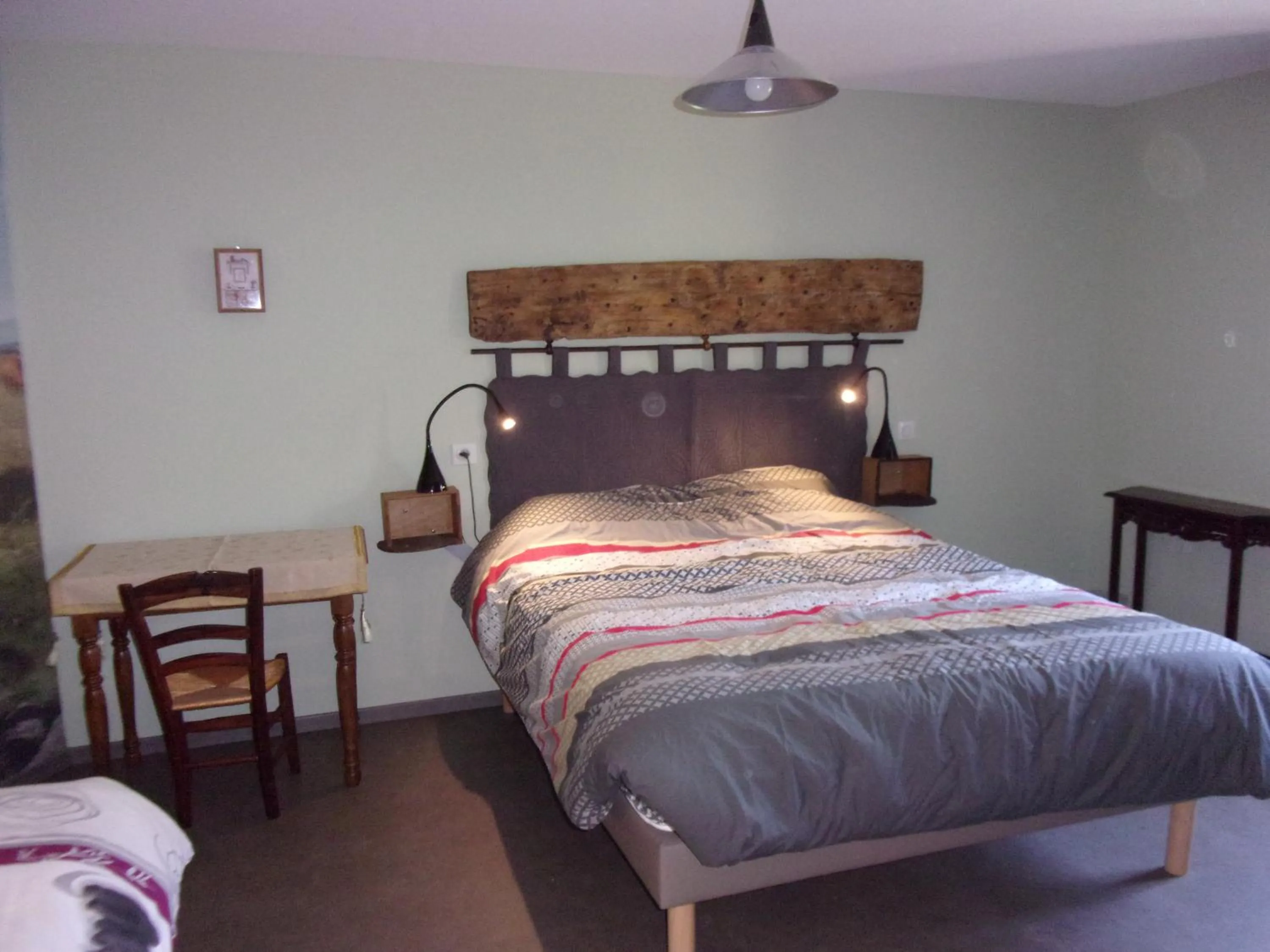 Bed in Chambre d'hôtes Le Cascadou