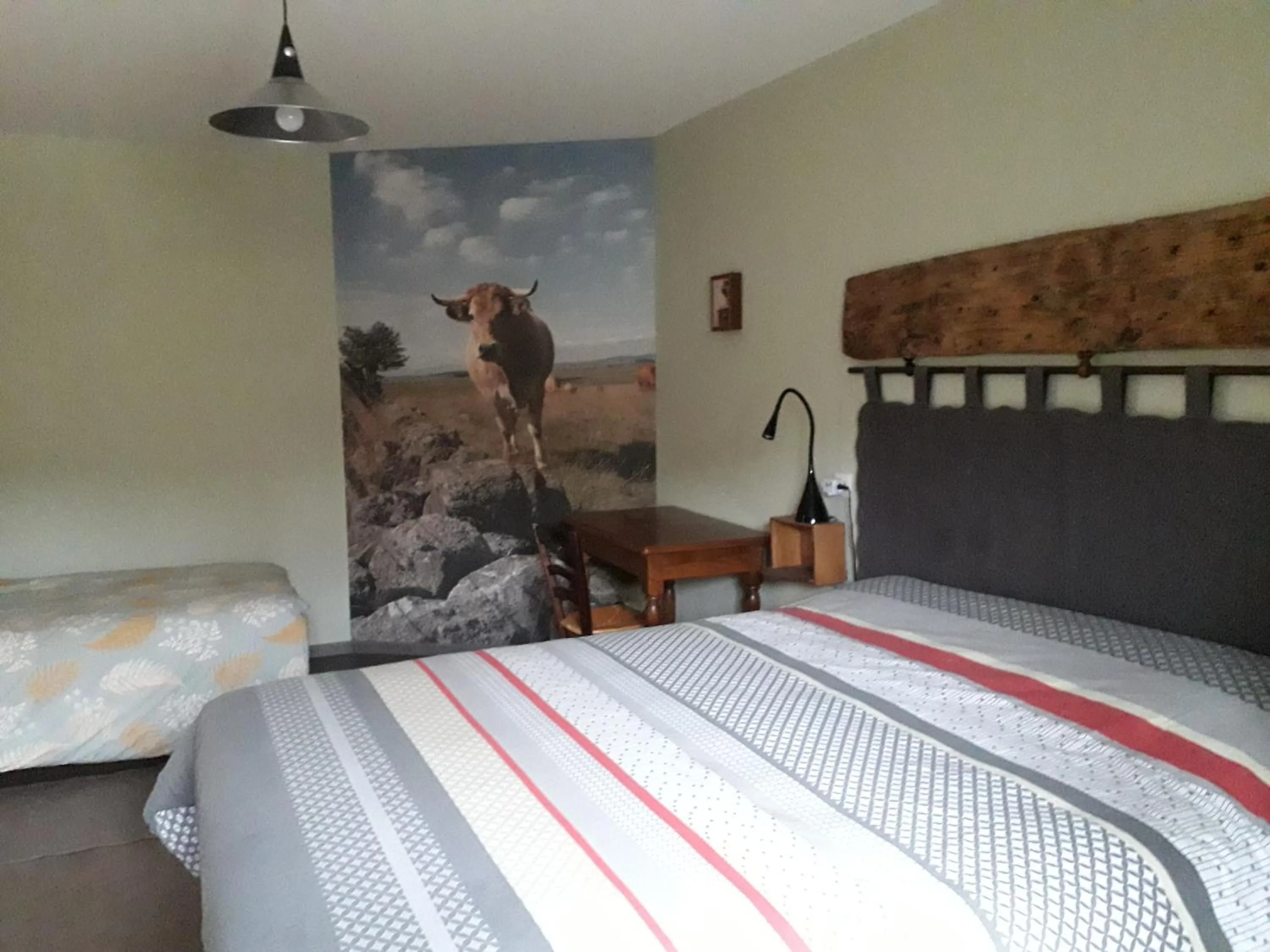 Bed in Chambre d'hôtes Le Cascadou