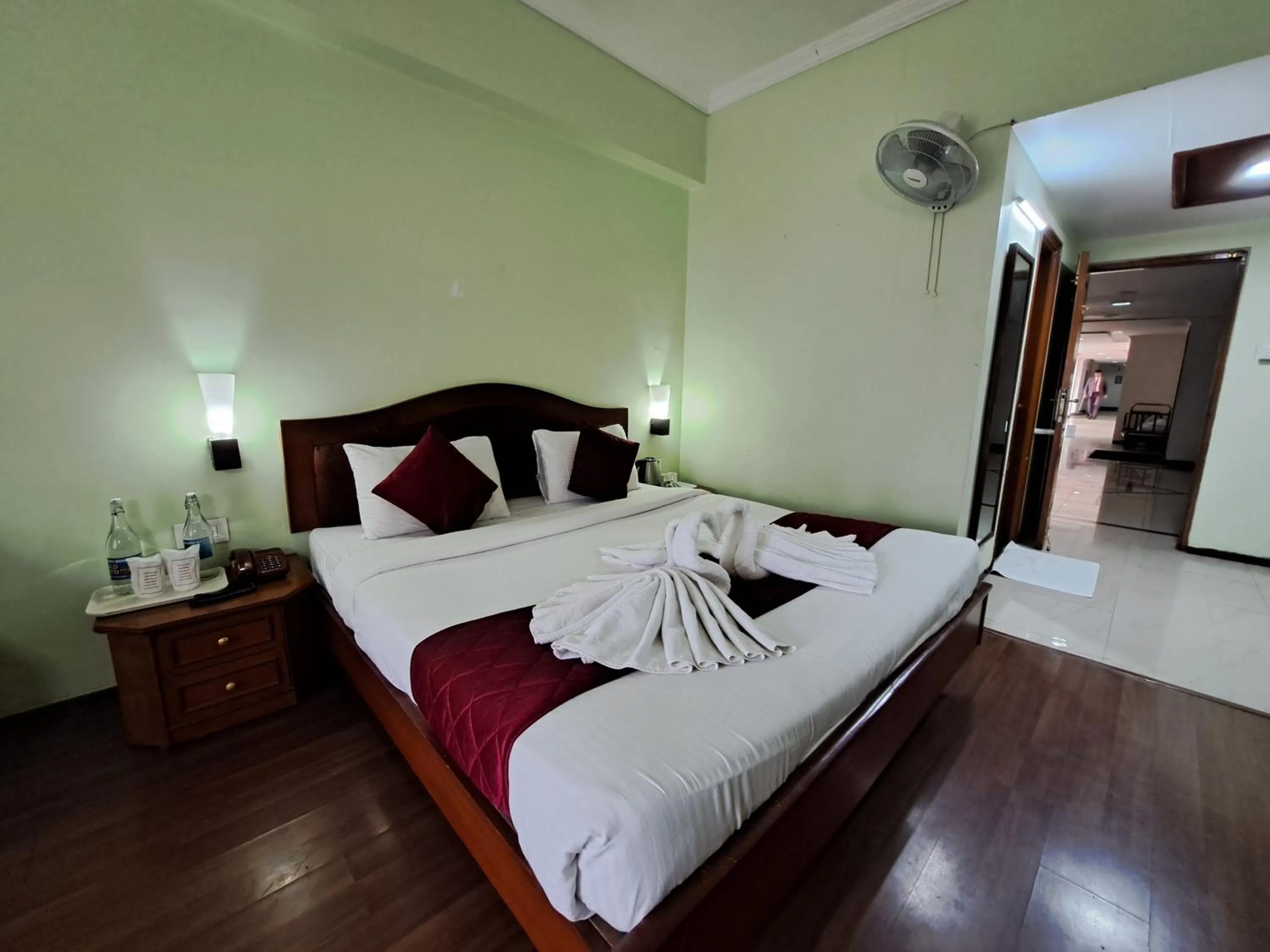 Bed in Hotel Preethi Classic Towers