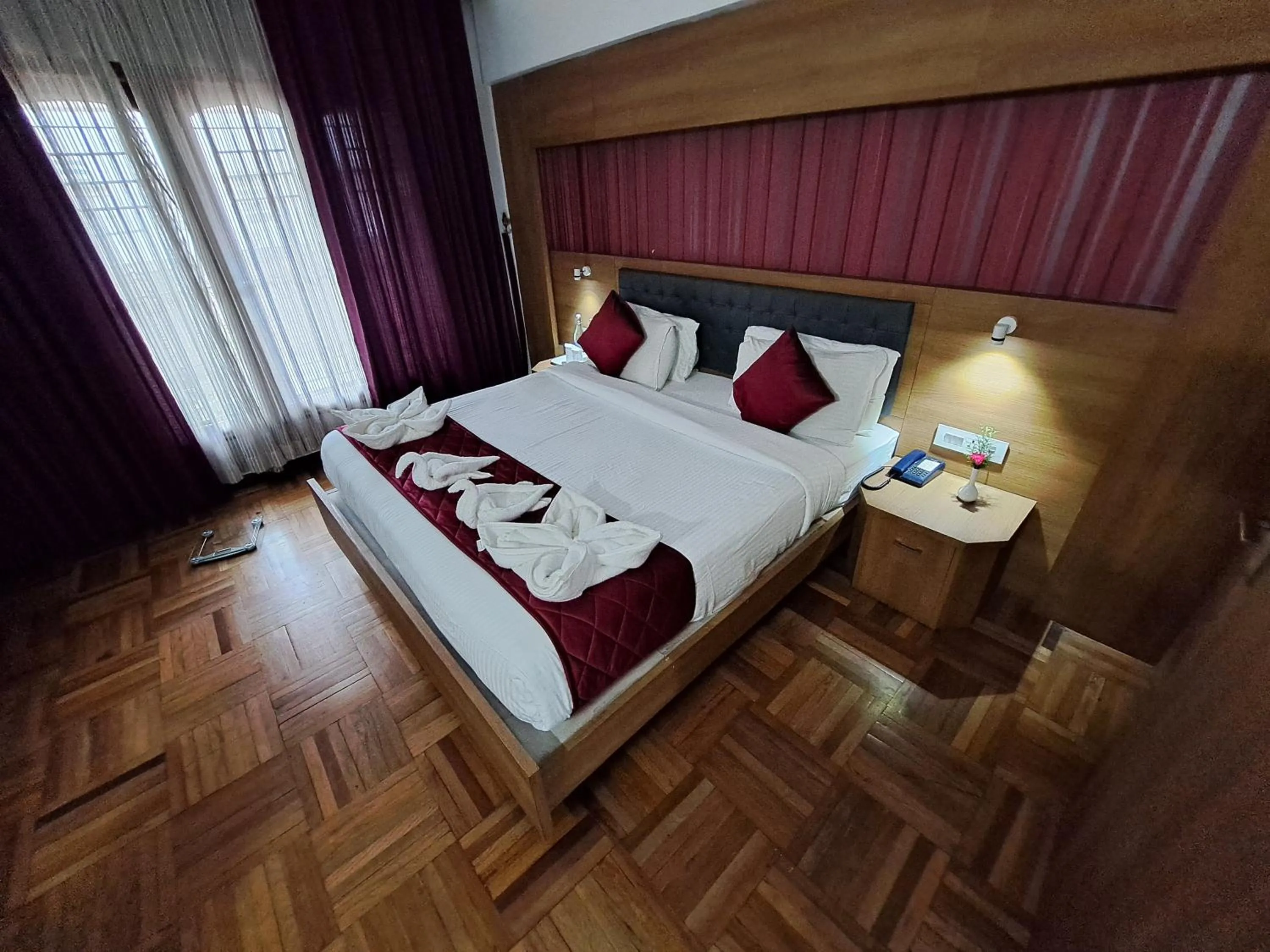 Bed in Hotel Preethi Classic Towers