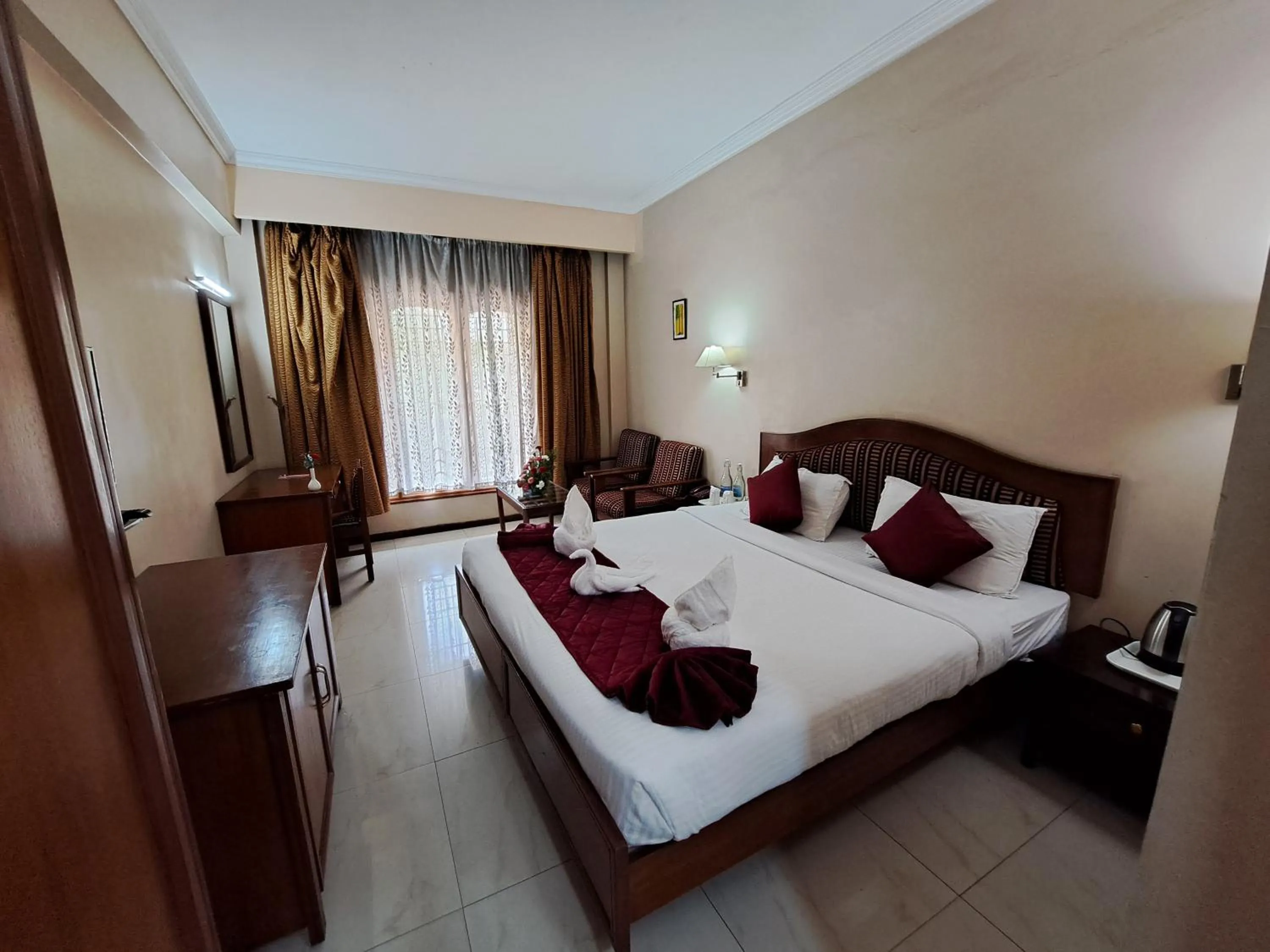 Bed in Hotel Preethi Classic Towers