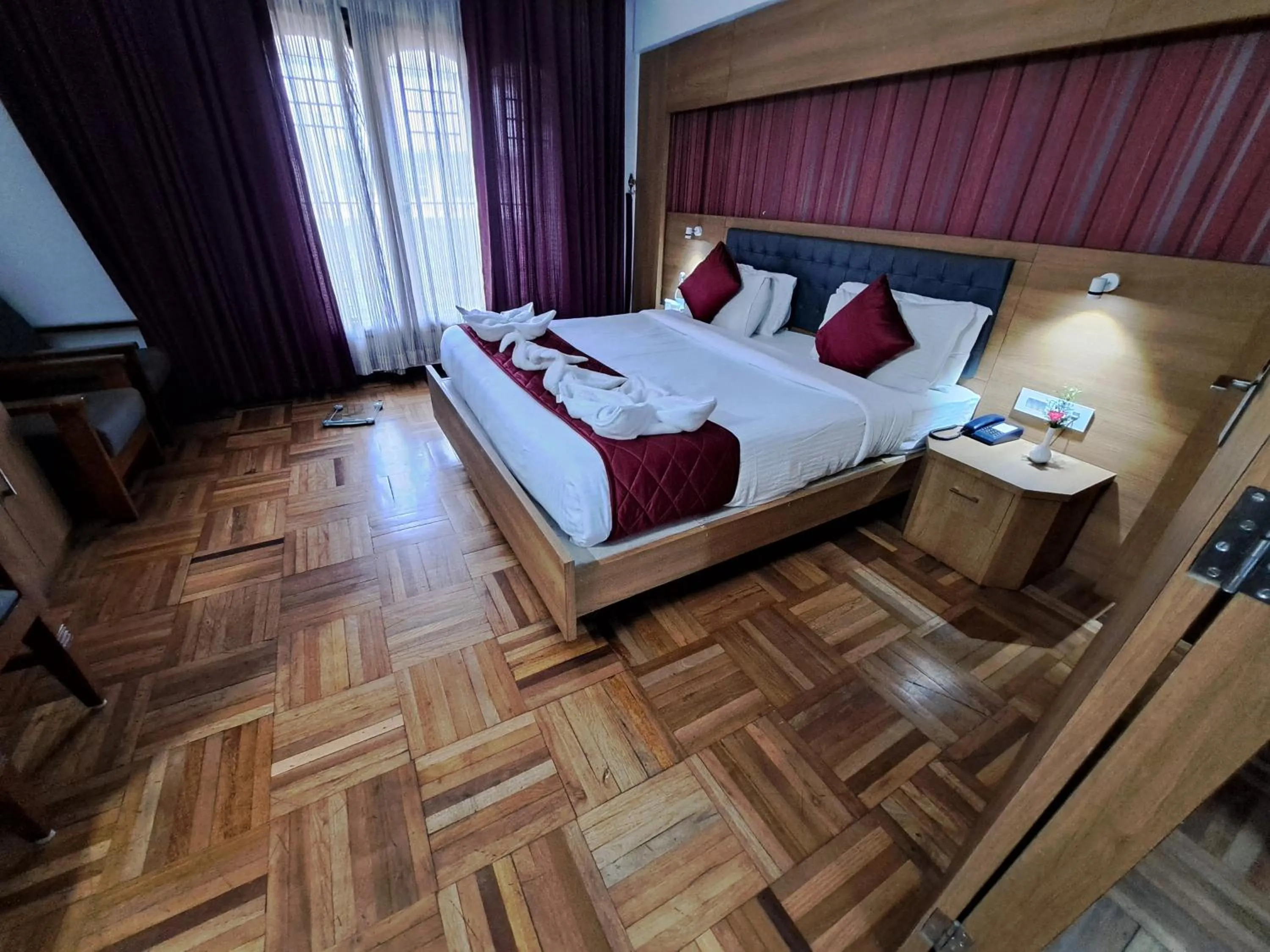 Bed in Hotel Preethi Classic Towers