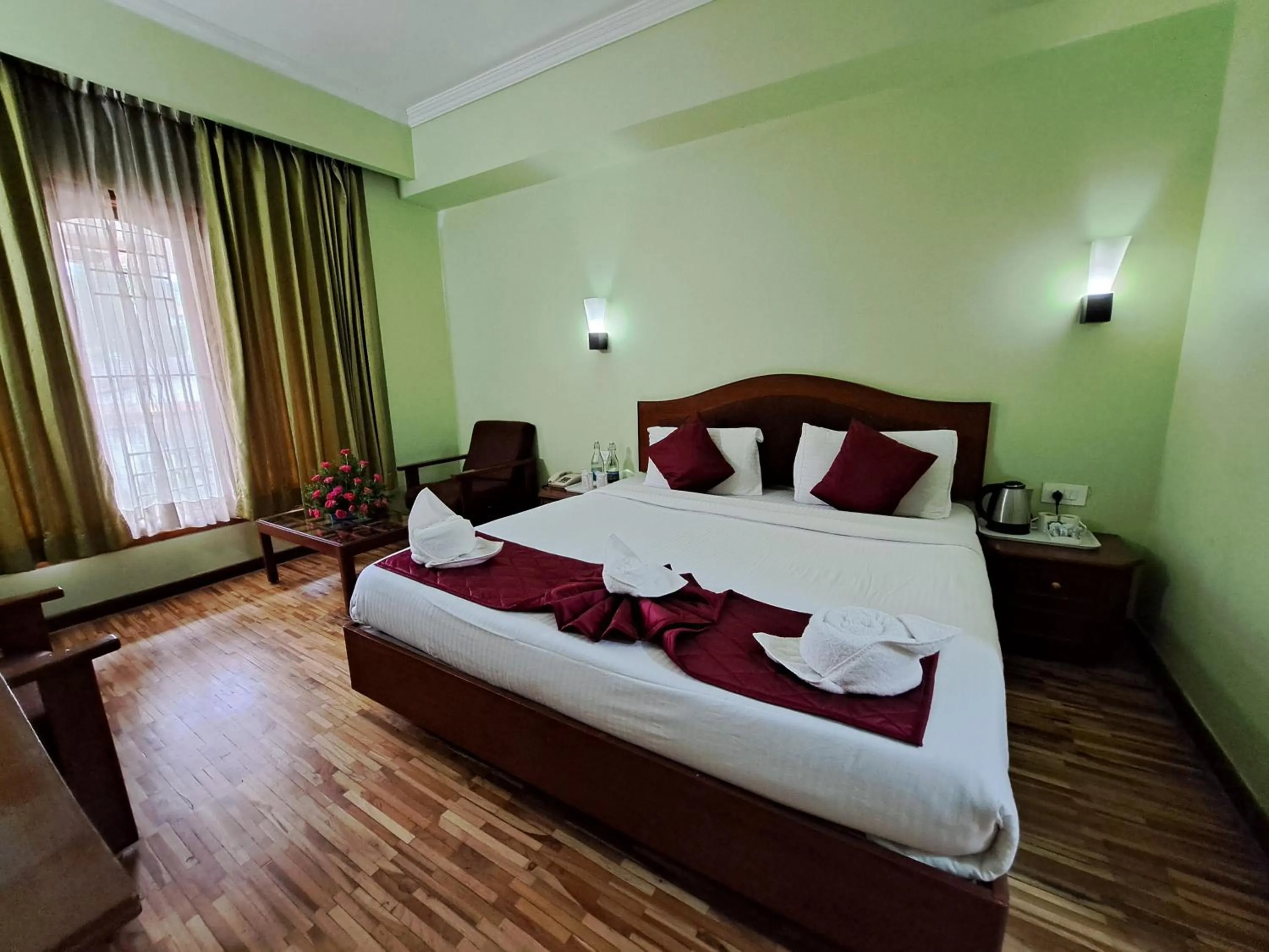 Bed in Hotel Preethi Classic Towers
