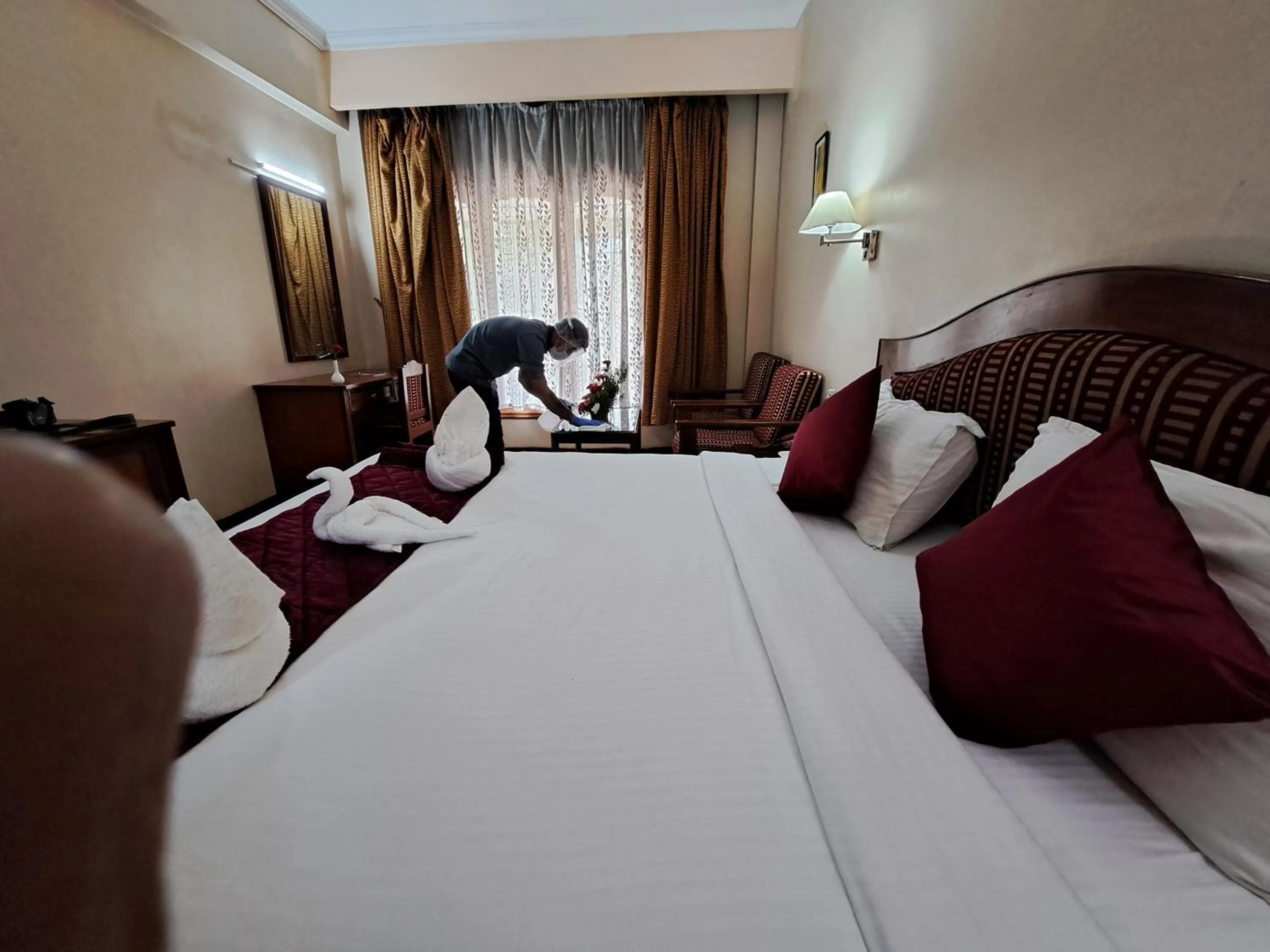 Bed in Hotel Preethi Classic Towers