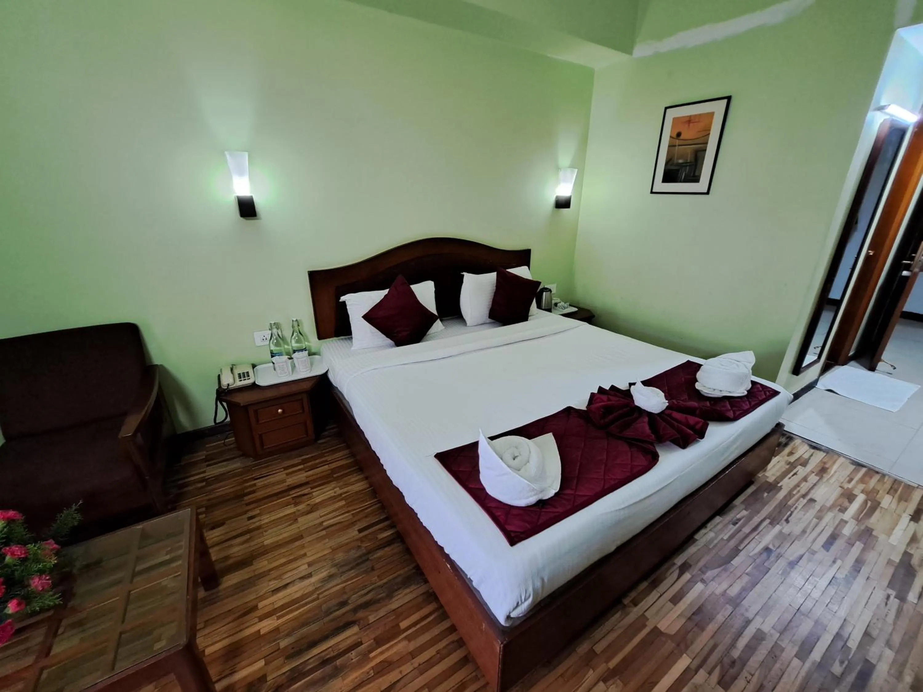Bed in Hotel Preethi Classic Towers