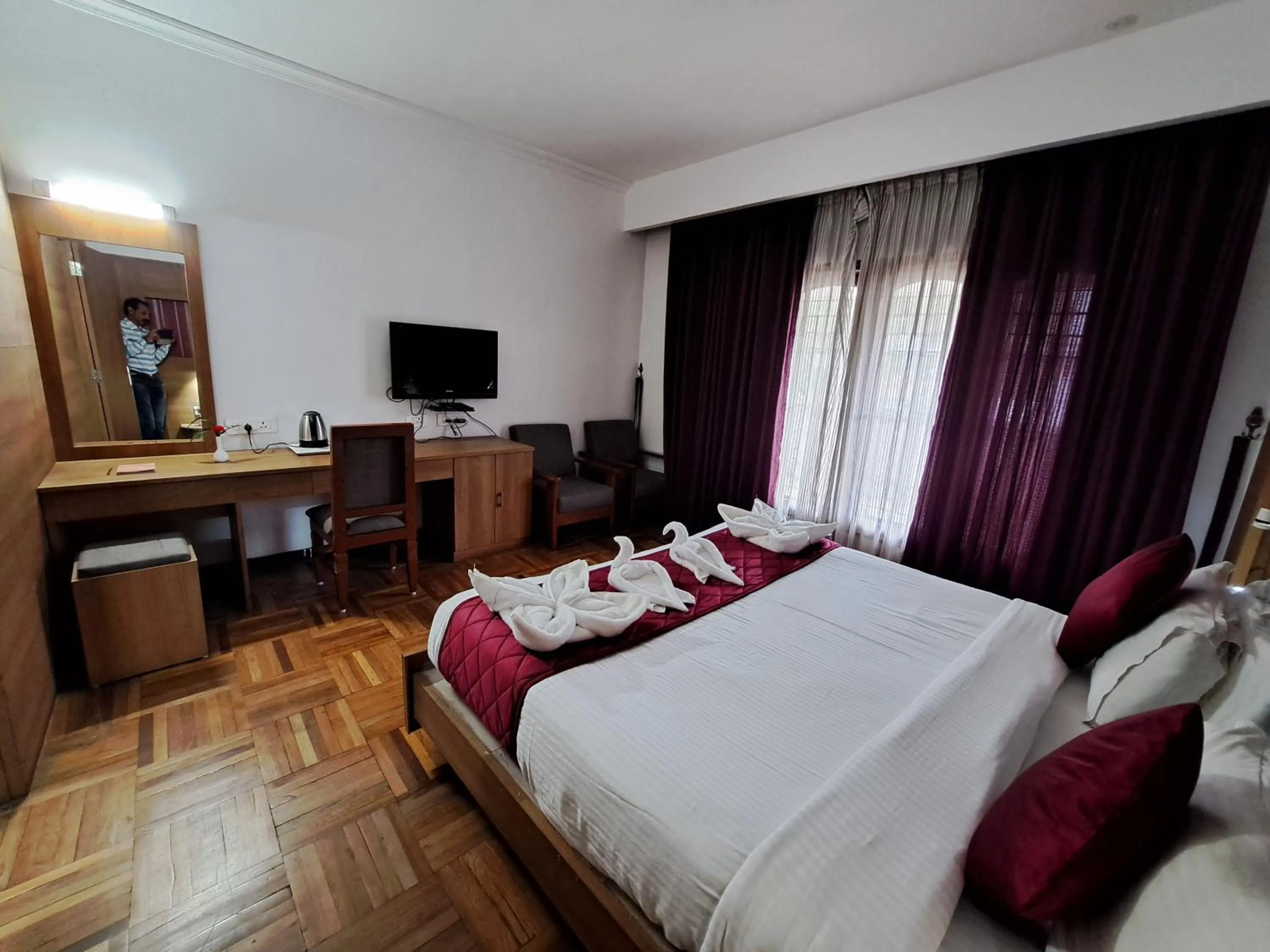 Bed in Hotel Preethi Classic Towers