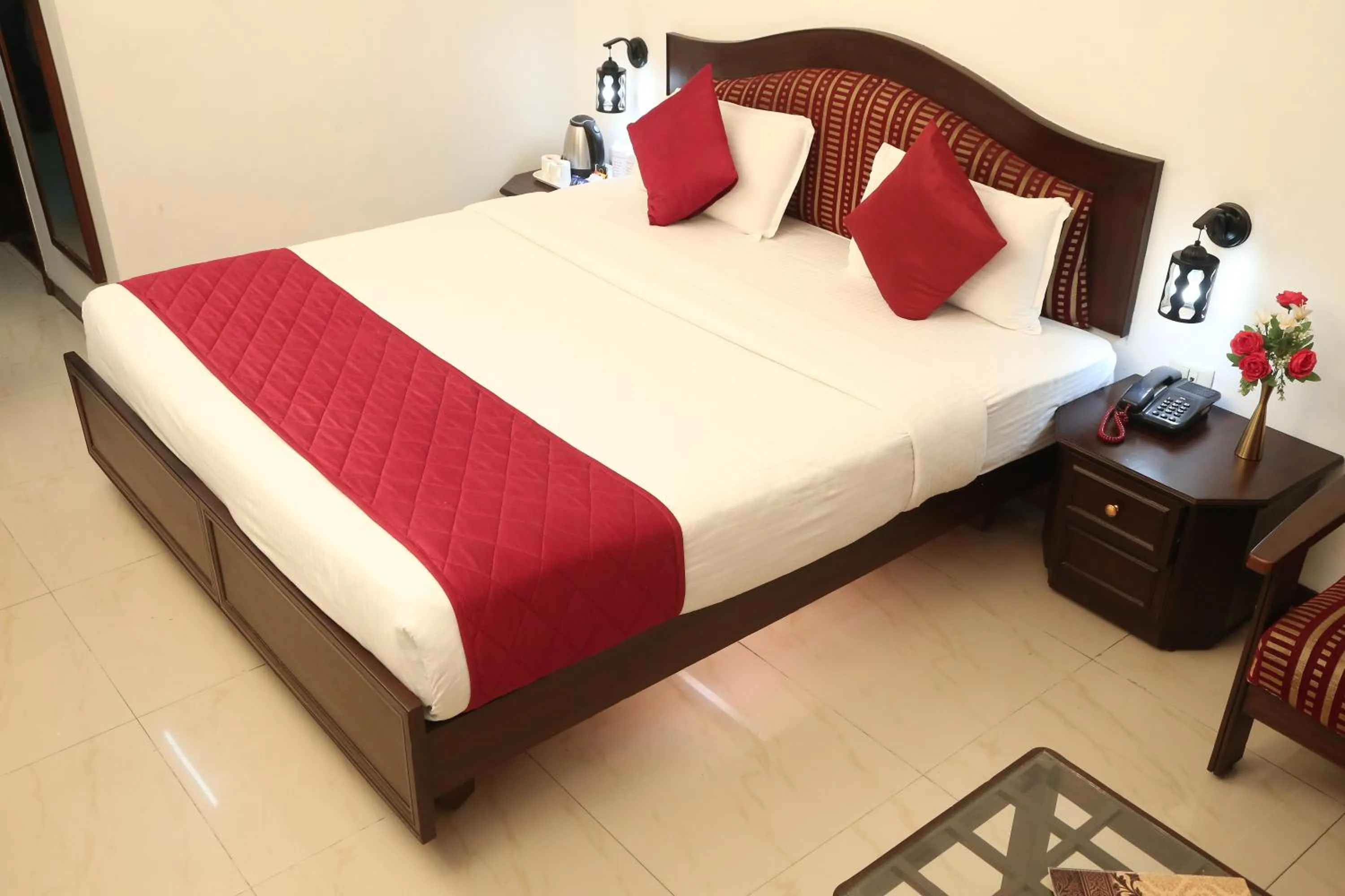 Bed in Hotel Preethi Classic Towers