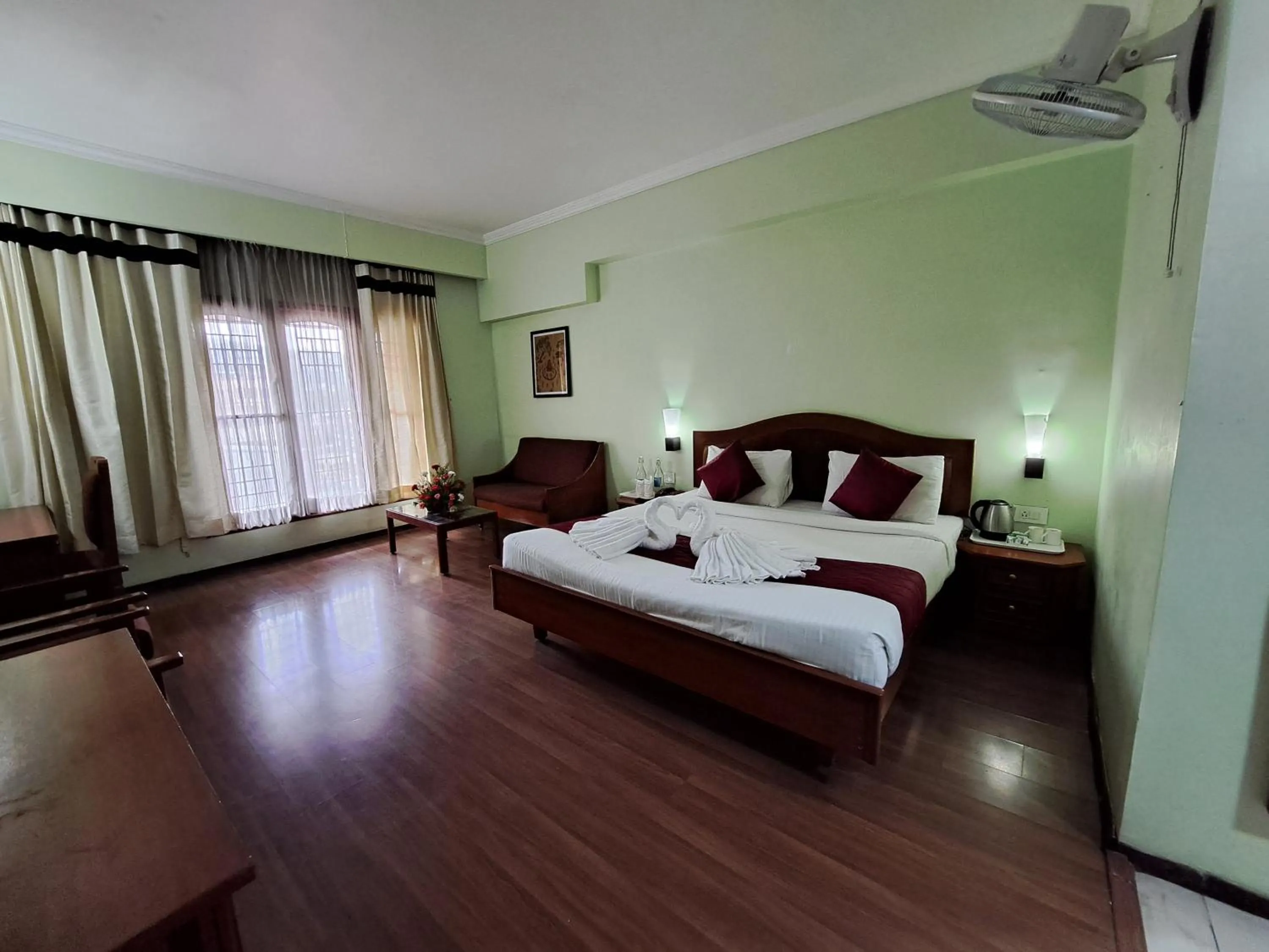 Bed in Hotel Preethi Classic Towers