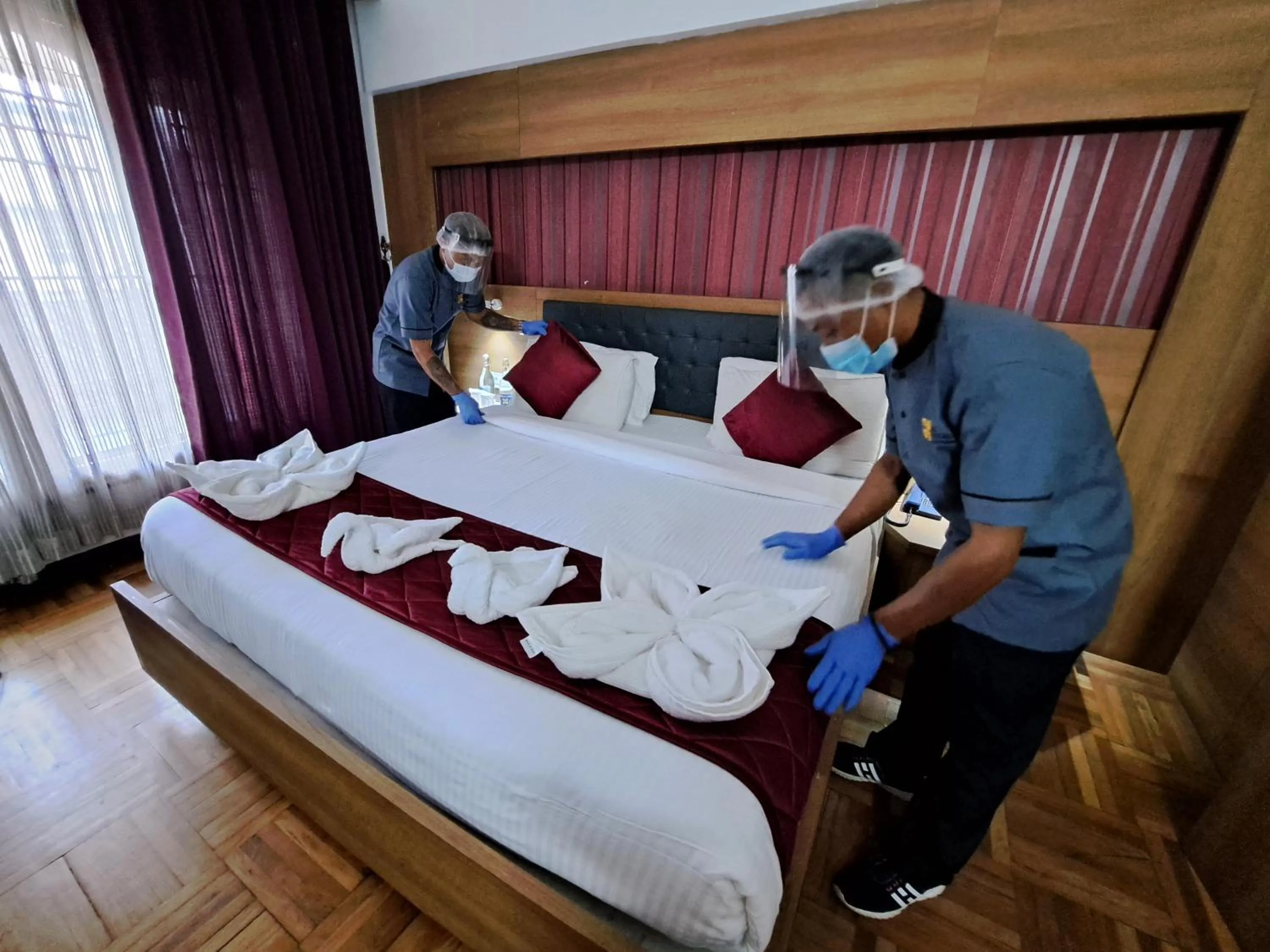 Bed in Hotel Preethi Classic Towers