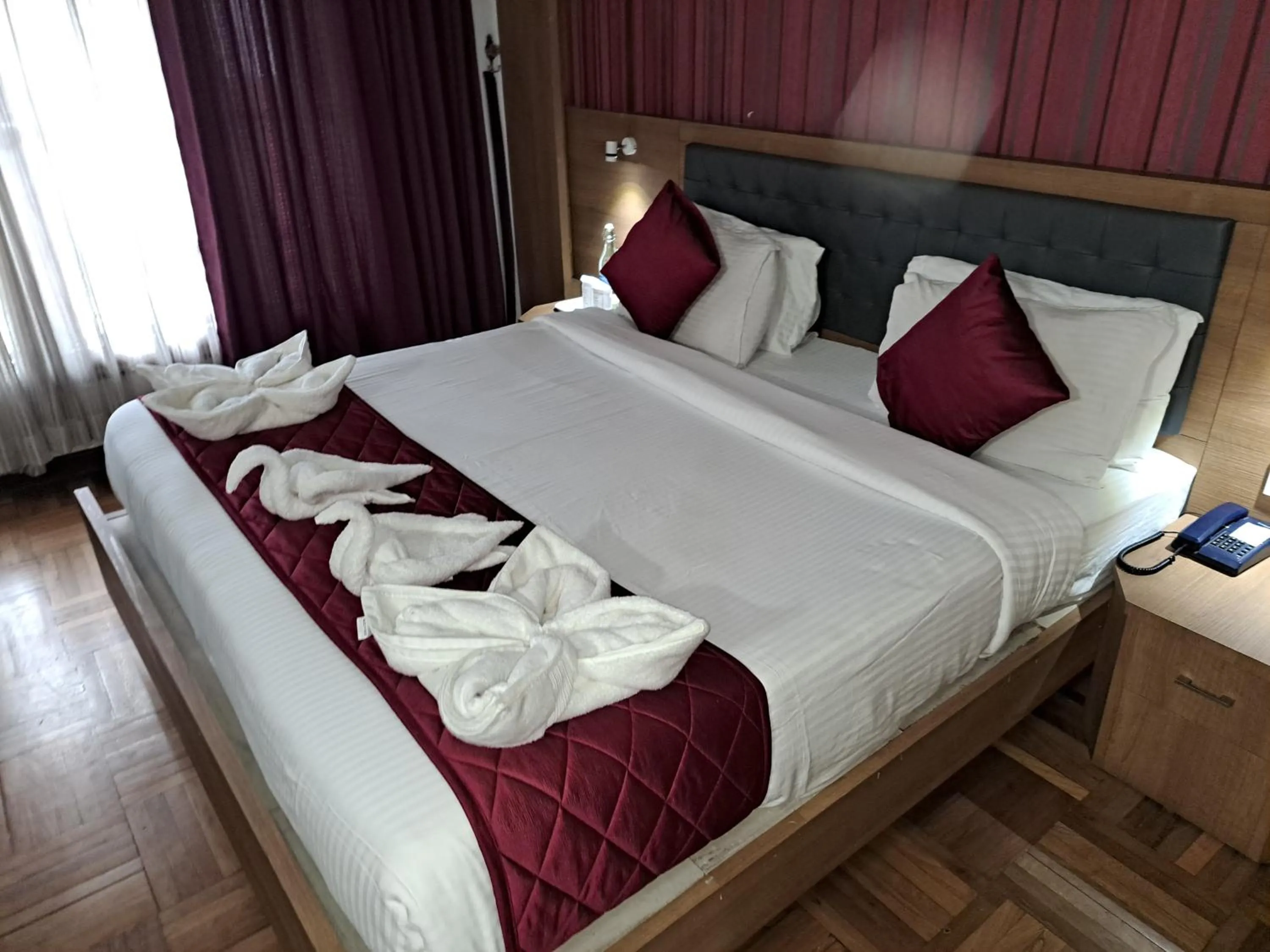 Bed in Hotel Preethi Classic Towers