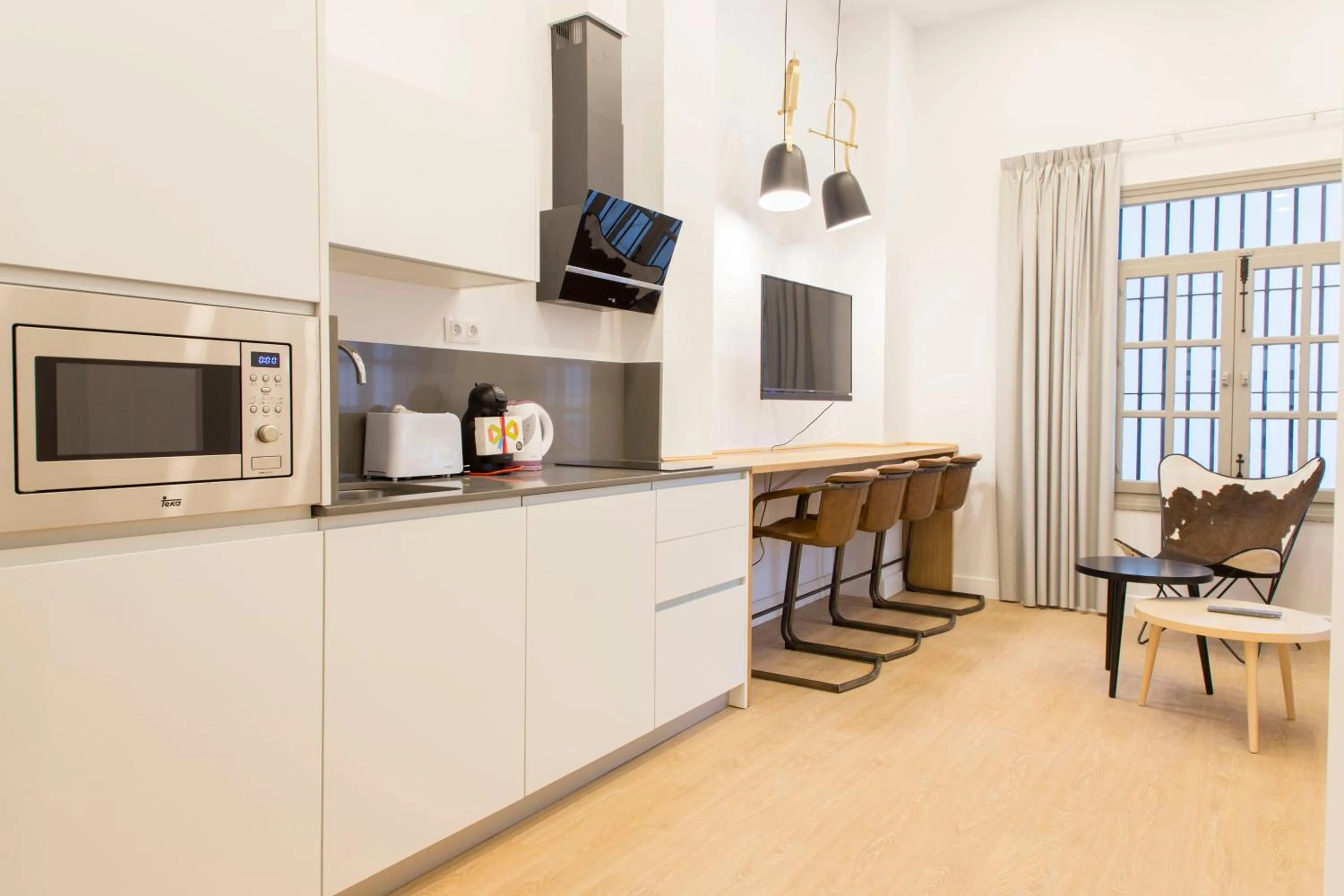 Kitchen or kitchenette in NineSuites
