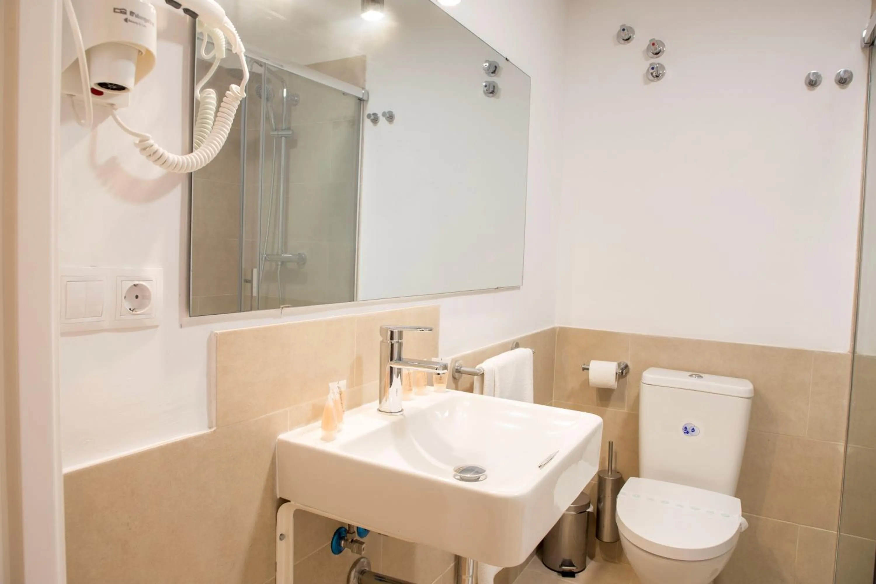 Toilet in NineSuites