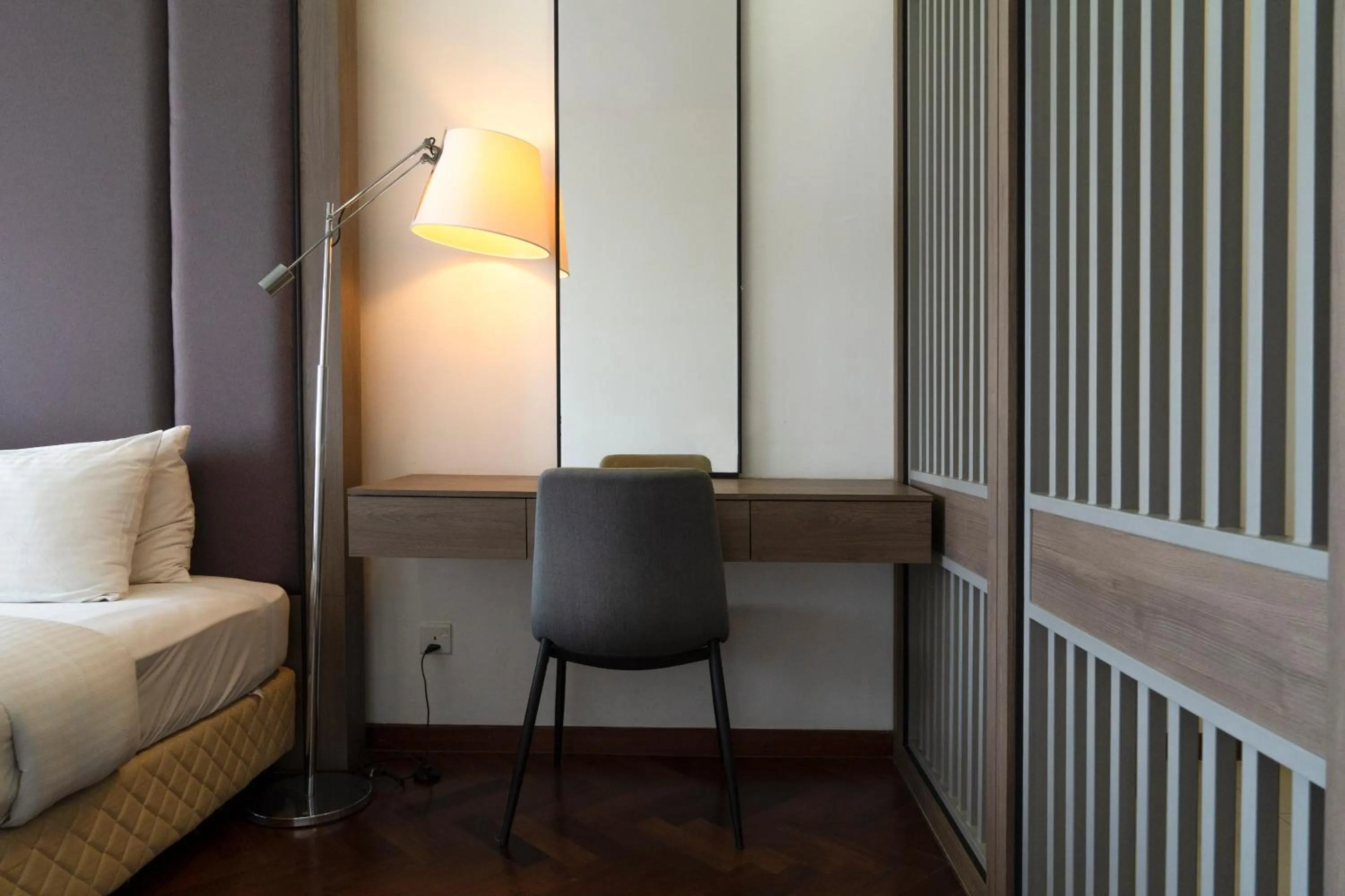 Seating area, Bed in The Landmark by Katana