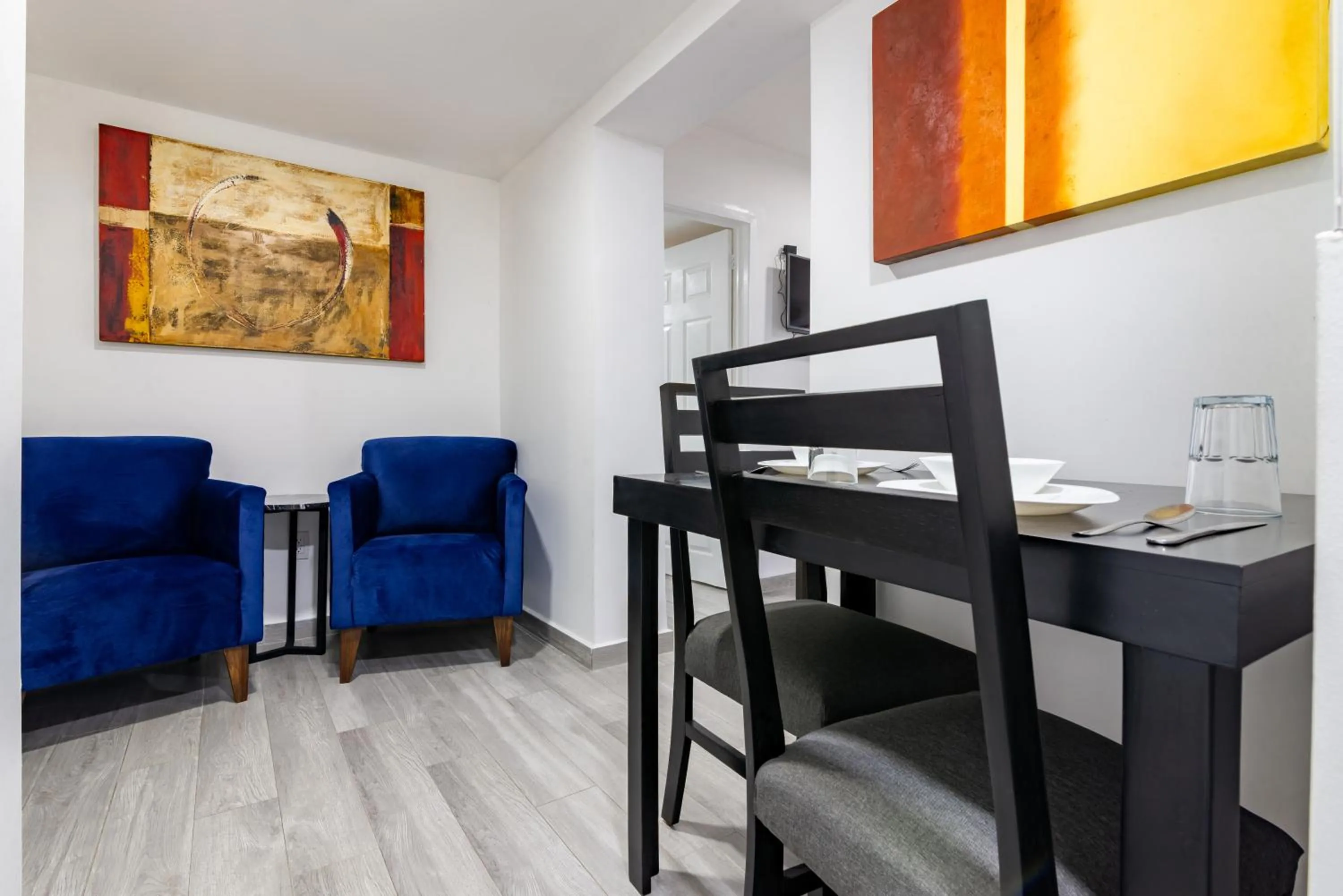 Dining area, Bed in European Life Style Executive Suites