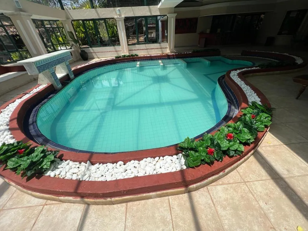 Swimming pool in Pousada Candonga da Serra