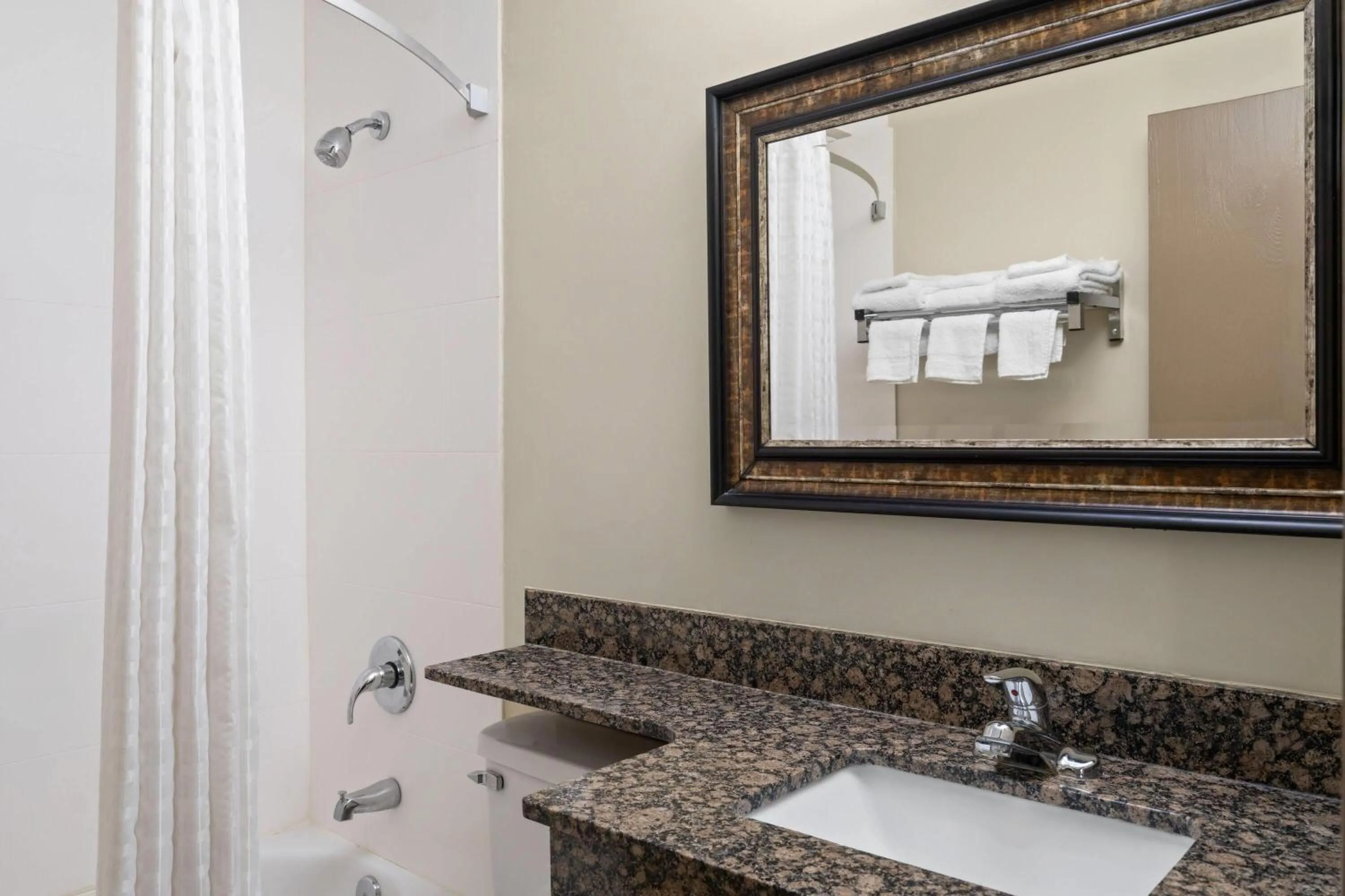 Bathroom in Super 8 by Wyndham Hagerstown I-70