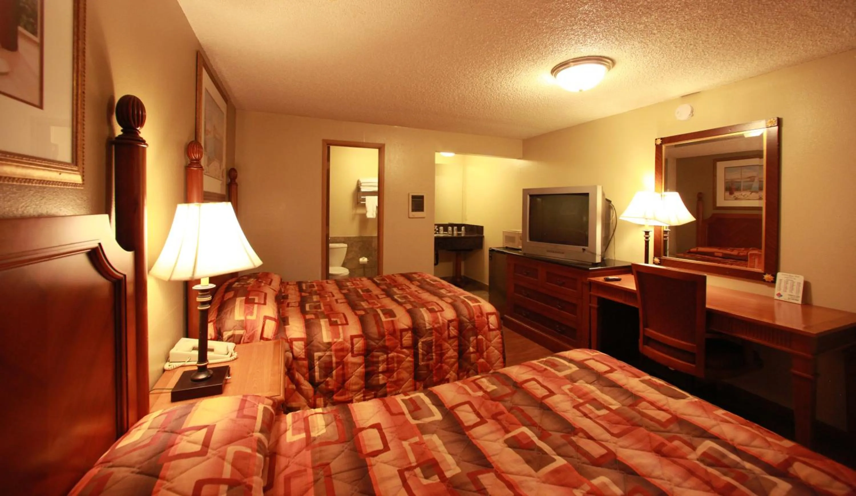 Photo of the whole room, Bed in Executive Motel