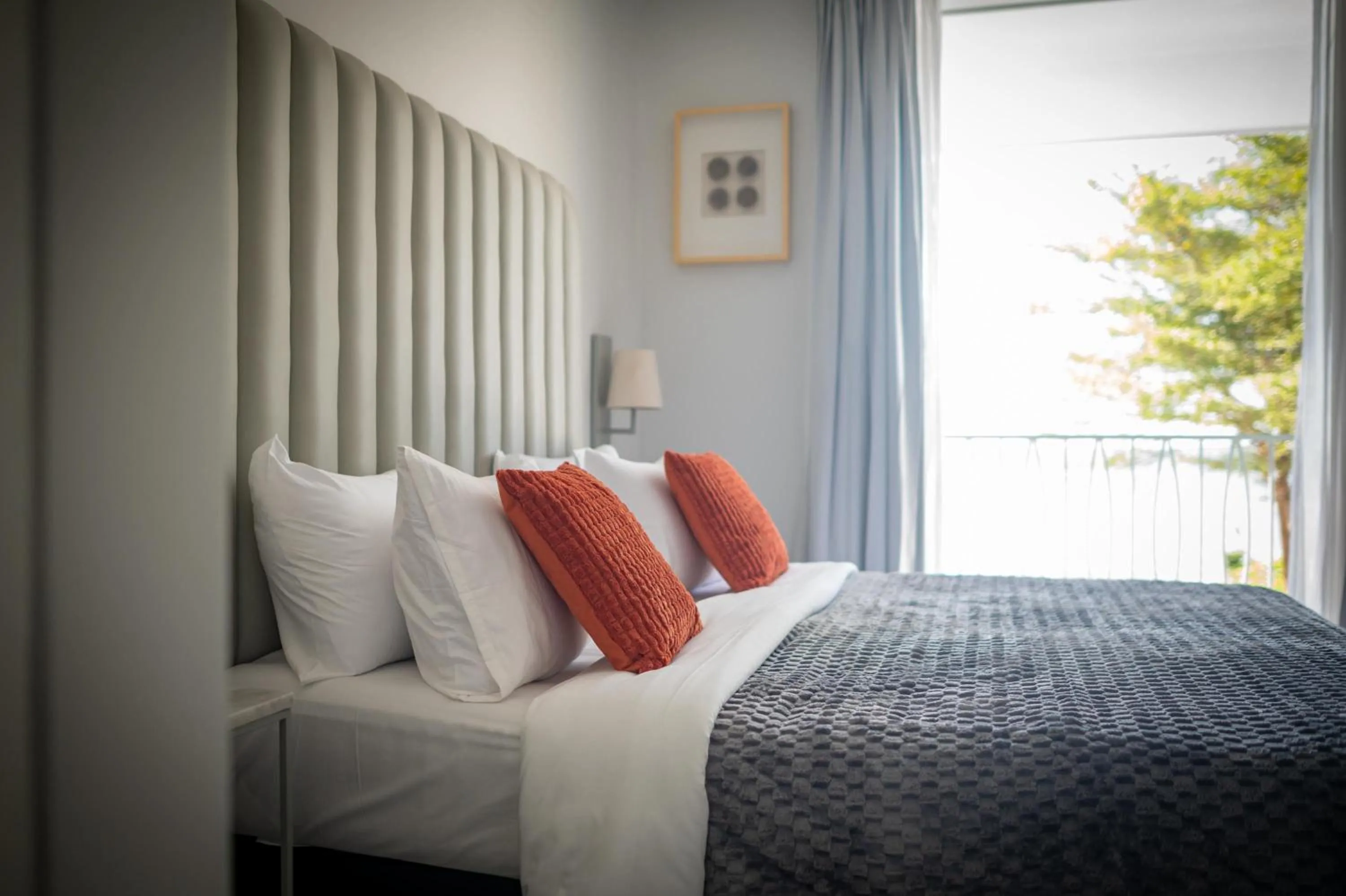 Bed in Lusa Beach Studios Under New Management And Newly Renovated