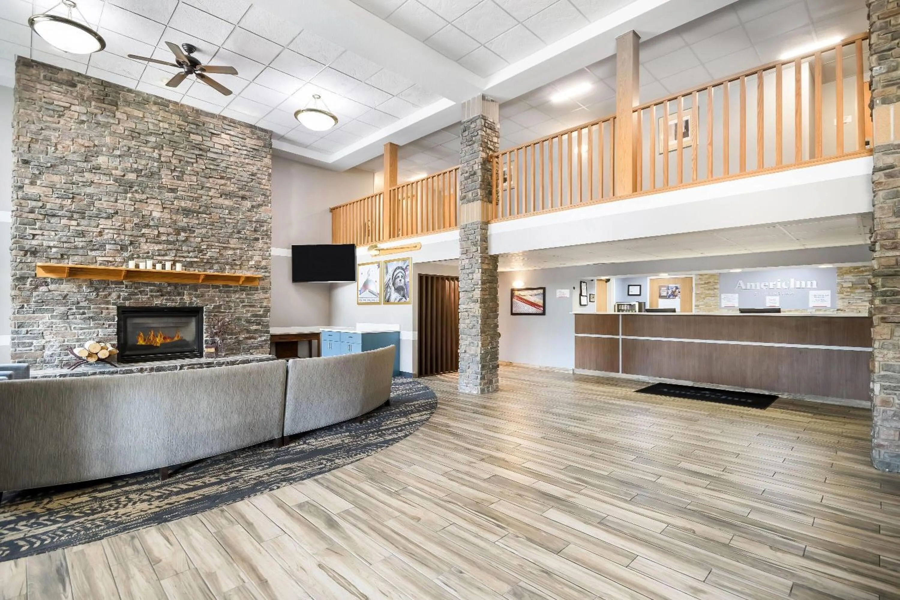 Lobby or reception in AmericInn by Wyndham Wausau