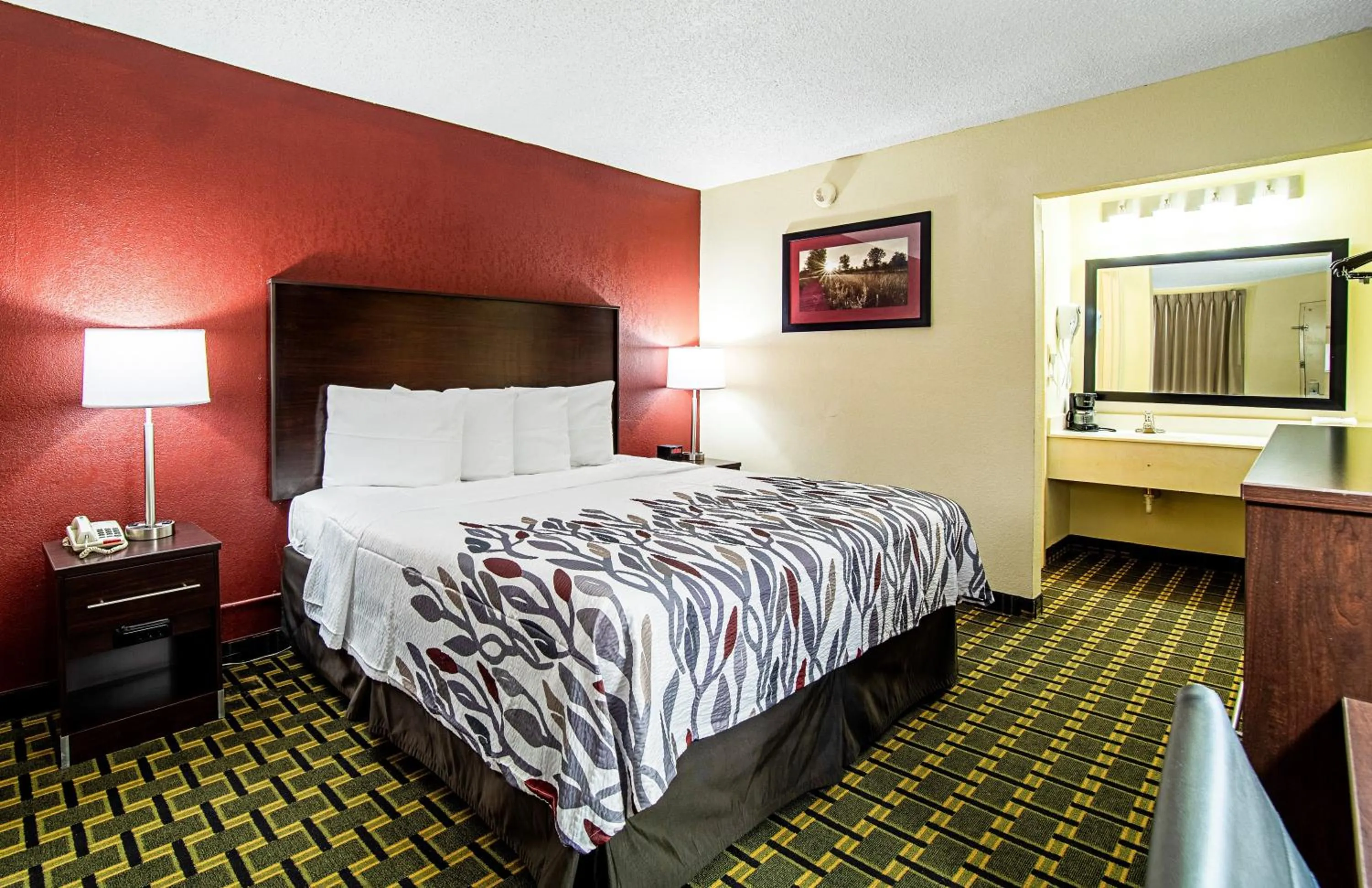 Photo of the whole room, Bed in Red Roof Inn & Suites Greenwood, SC