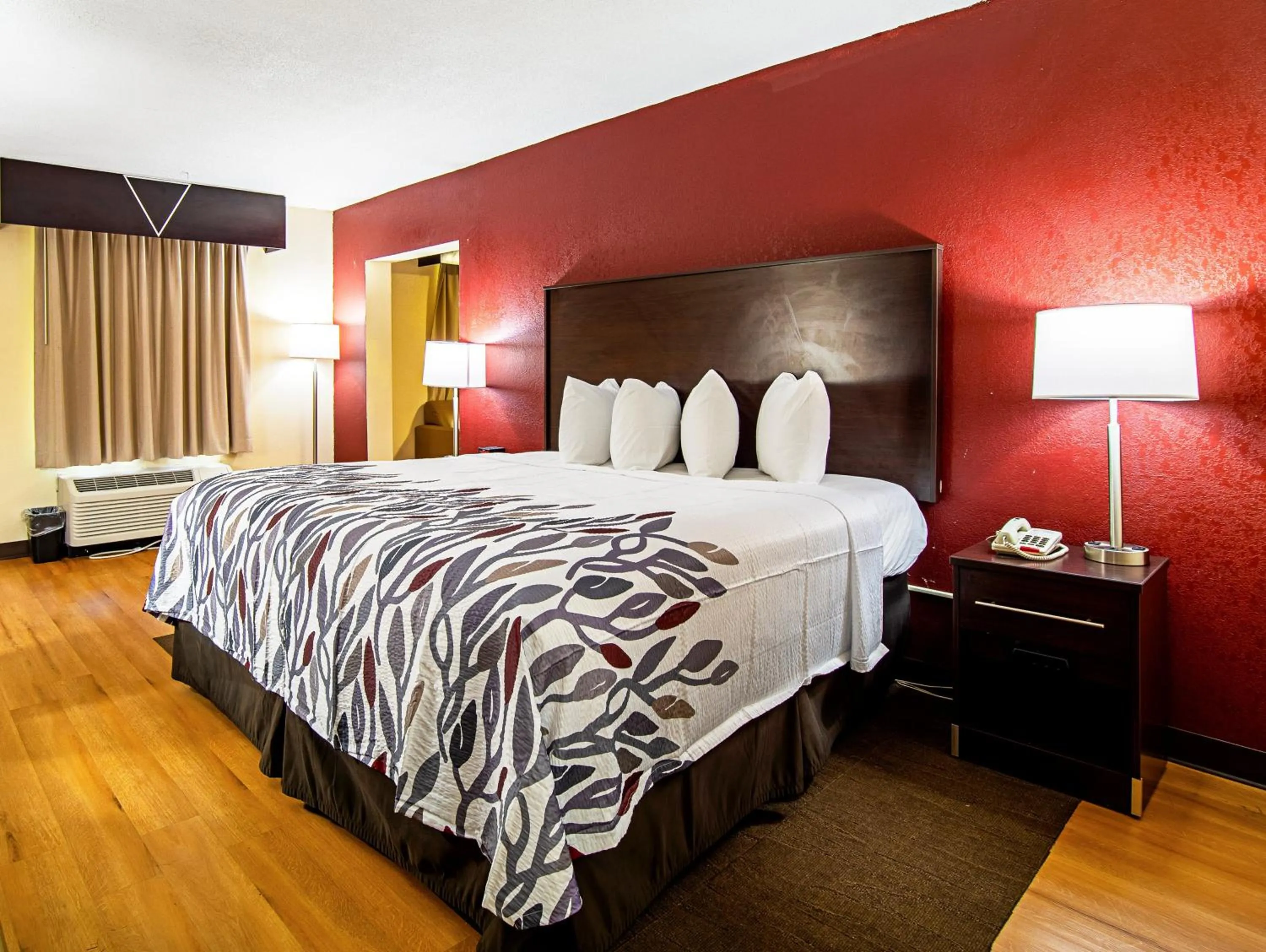 Photo of the whole room, Bed in Red Roof Inn & Suites Greenwood, SC