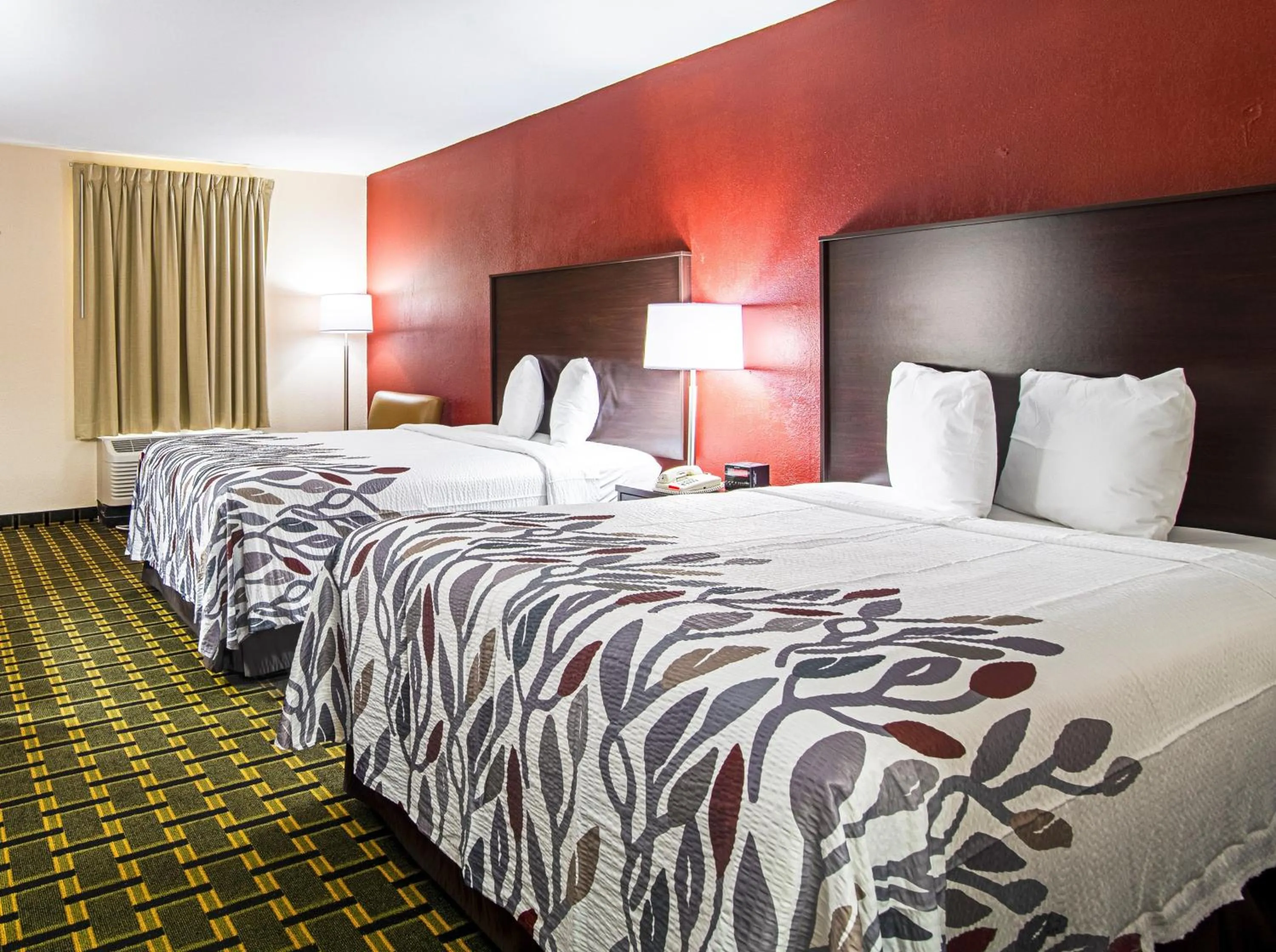 Photo of the whole room, Bed in Red Roof Inn & Suites Greenwood, SC