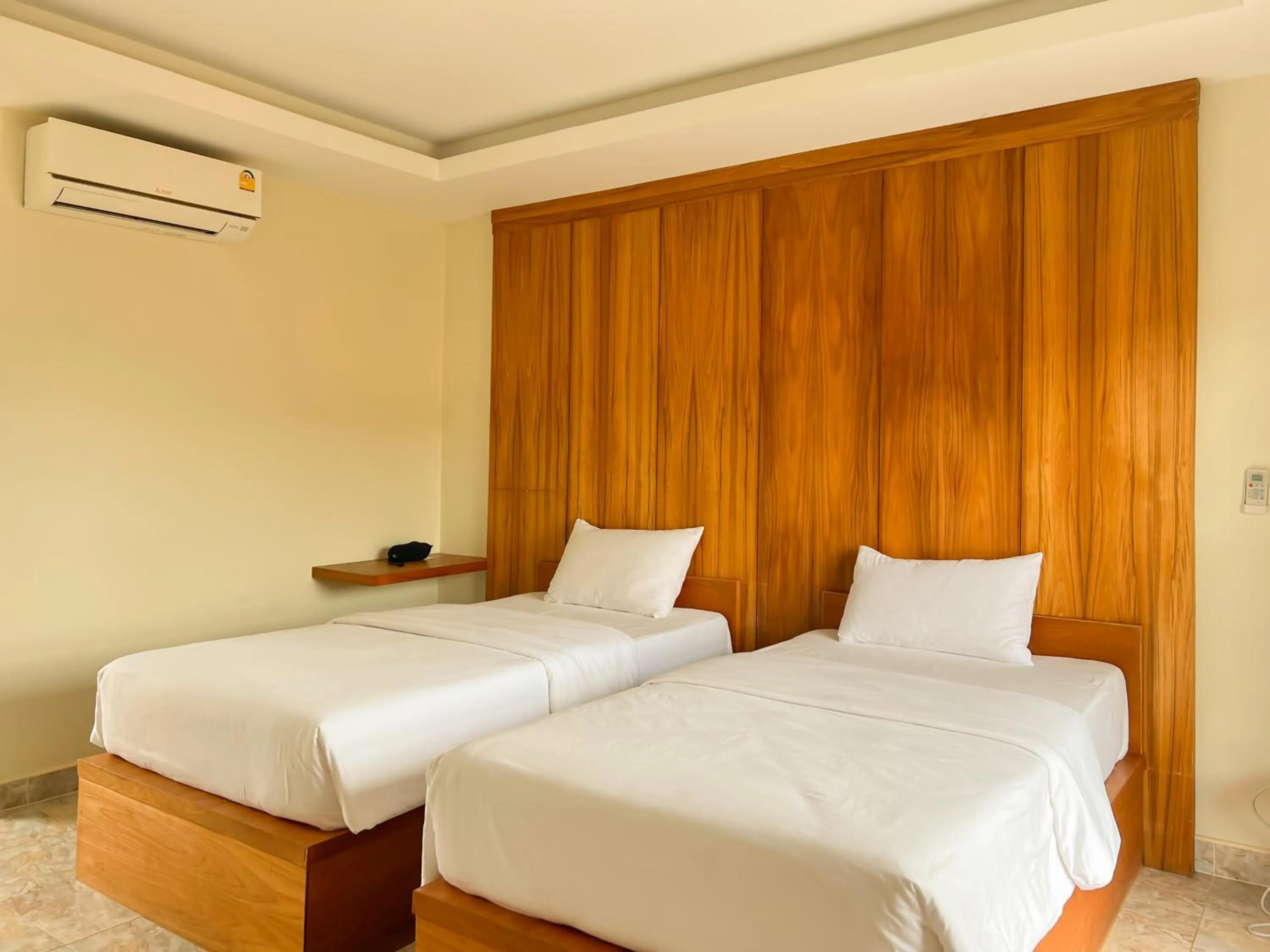 Bed in Tachang Airport Hotel