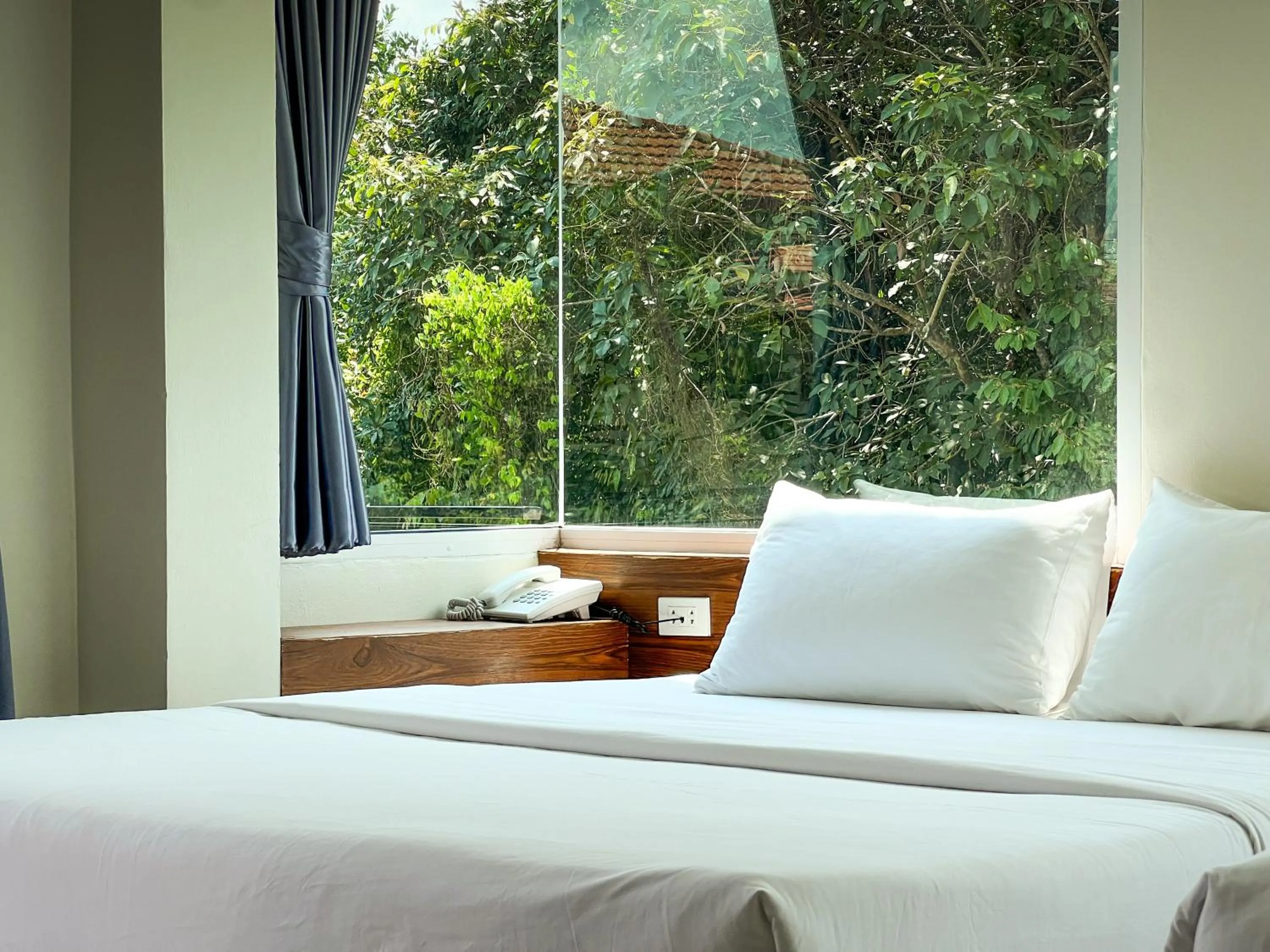 Bed in Tachang Airport Hotel