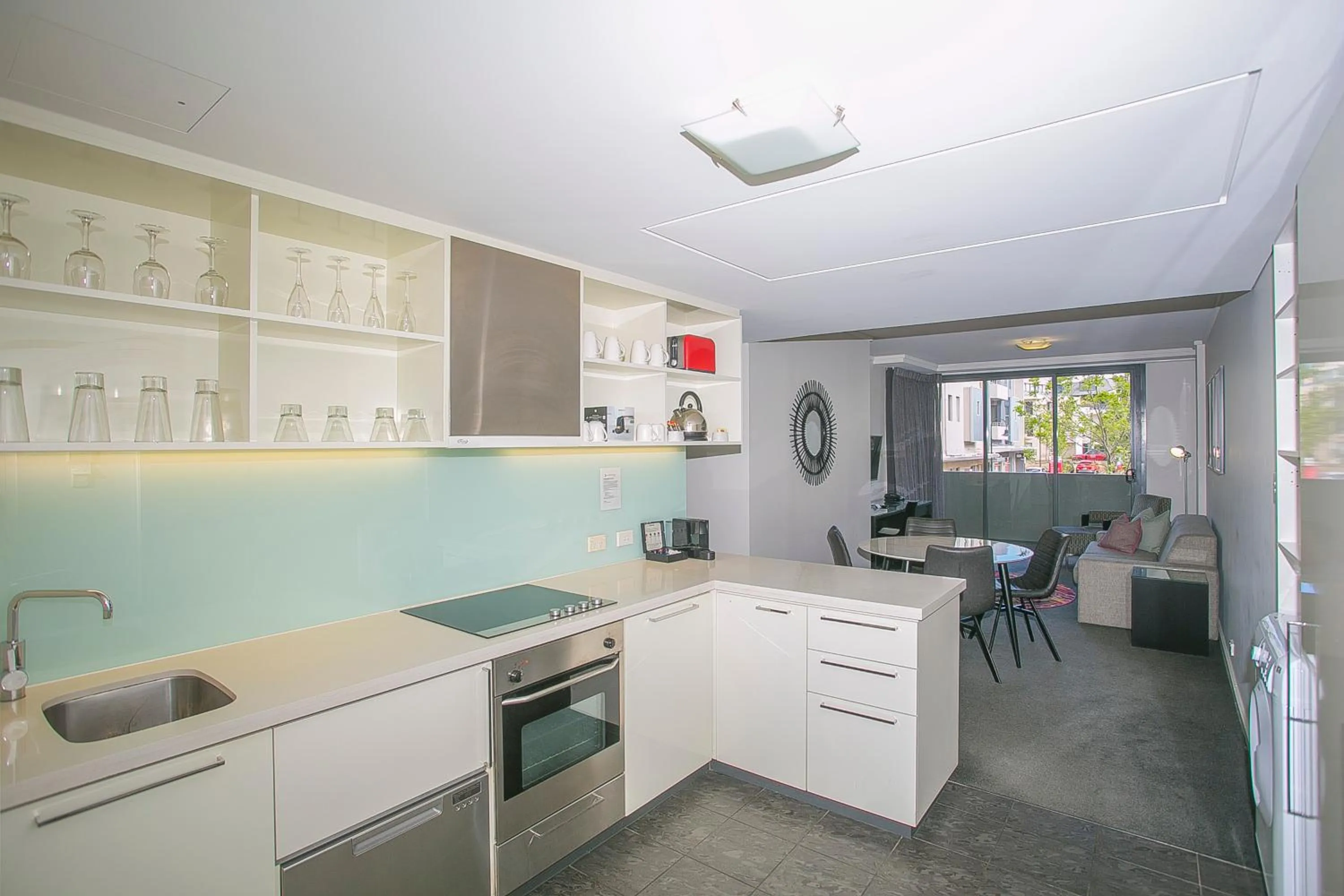 Communal lounge/ TV room in East Perth Suites Hotel