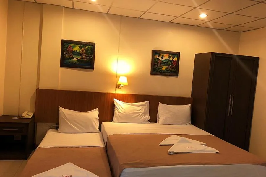 Bed in Lodge 61 Hotel