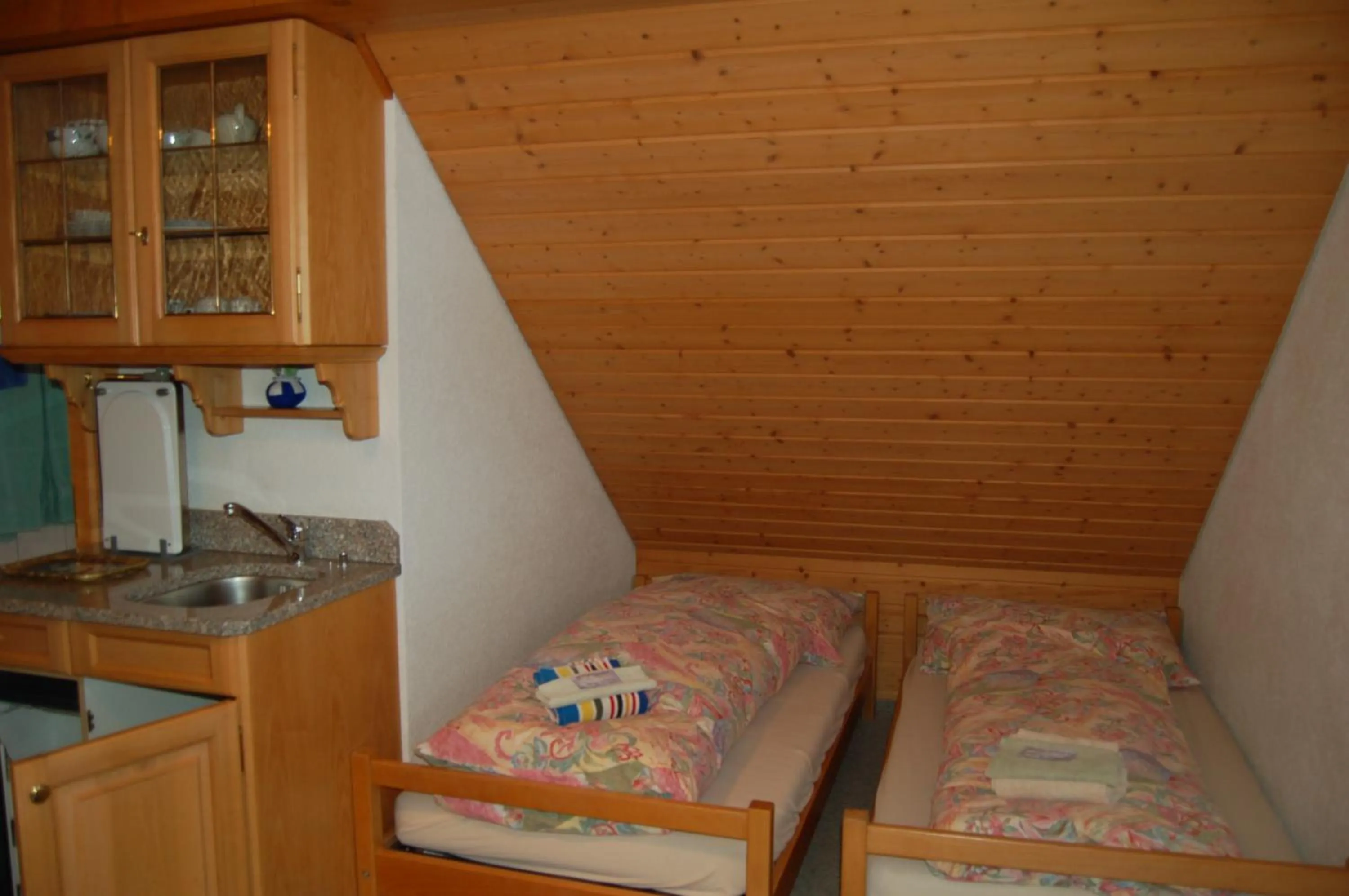 Living room, Bed in Gasthaus Schäfli