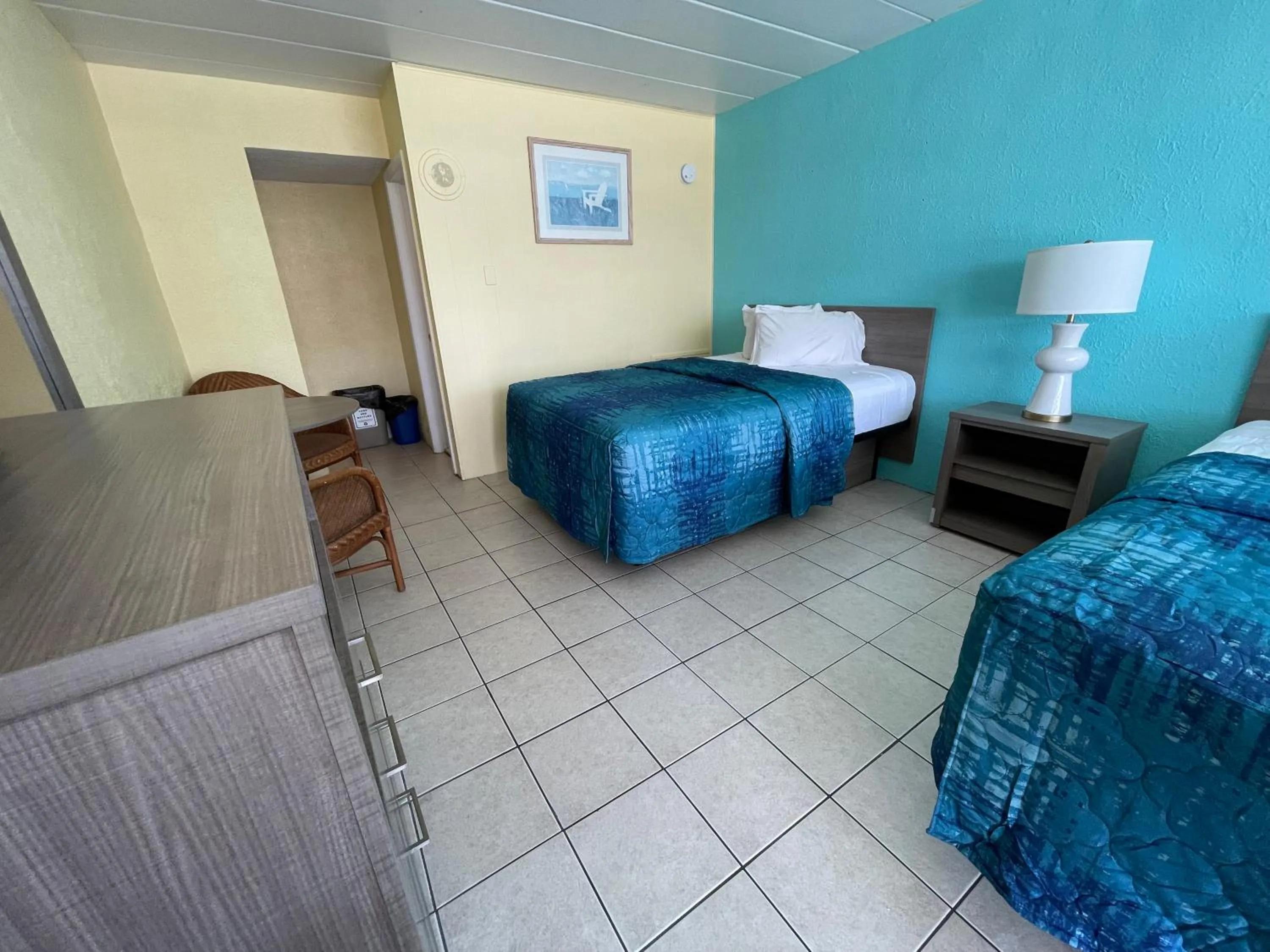 Bed in Bird of Paradise Motel