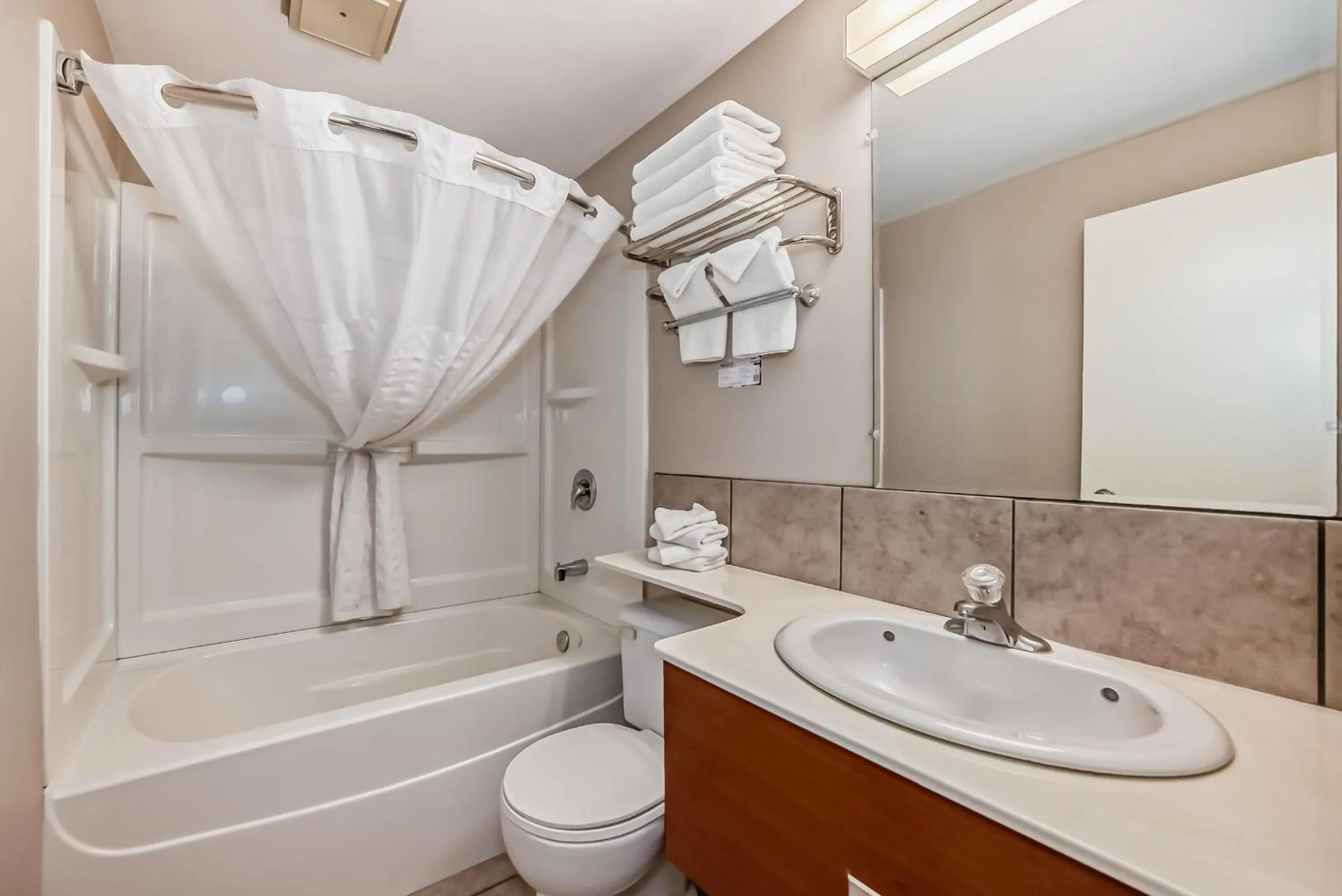 Bathroom in Jasper Inn & Suites by INNhotels