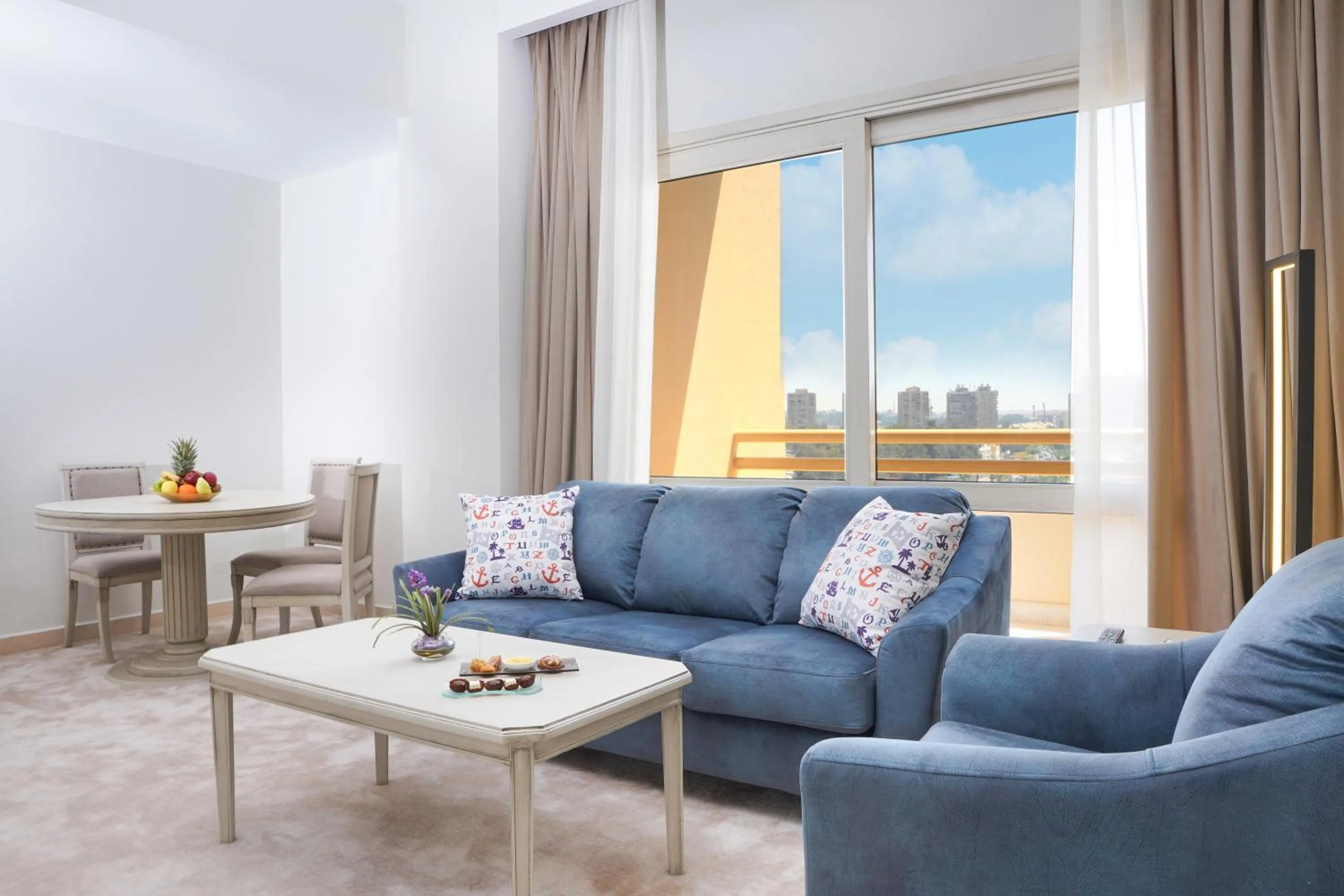 Living room in Triumph Plaza Hotel