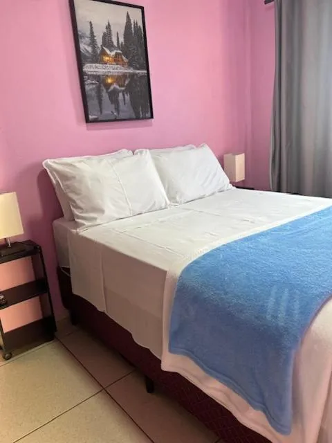 Bed in Pousada Mercosul