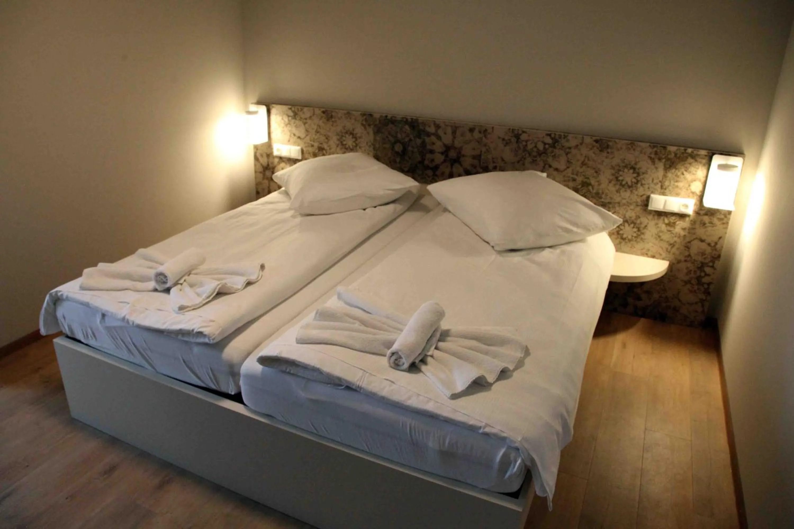 Bed in Pension Villa Colosseo im Herzen von Meiningen