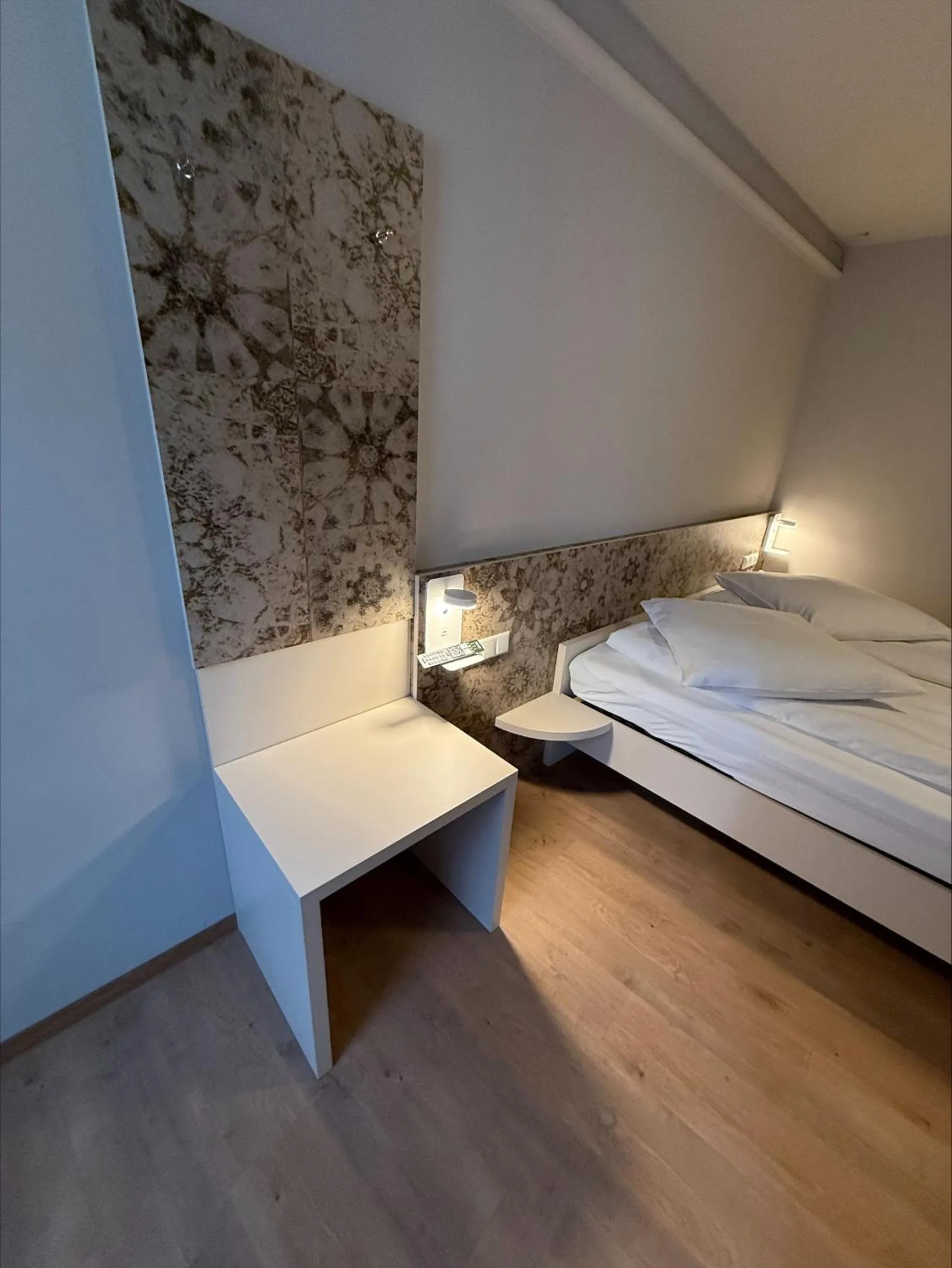 Bed in Pension Villa Colosseo im Herzen von Meiningen