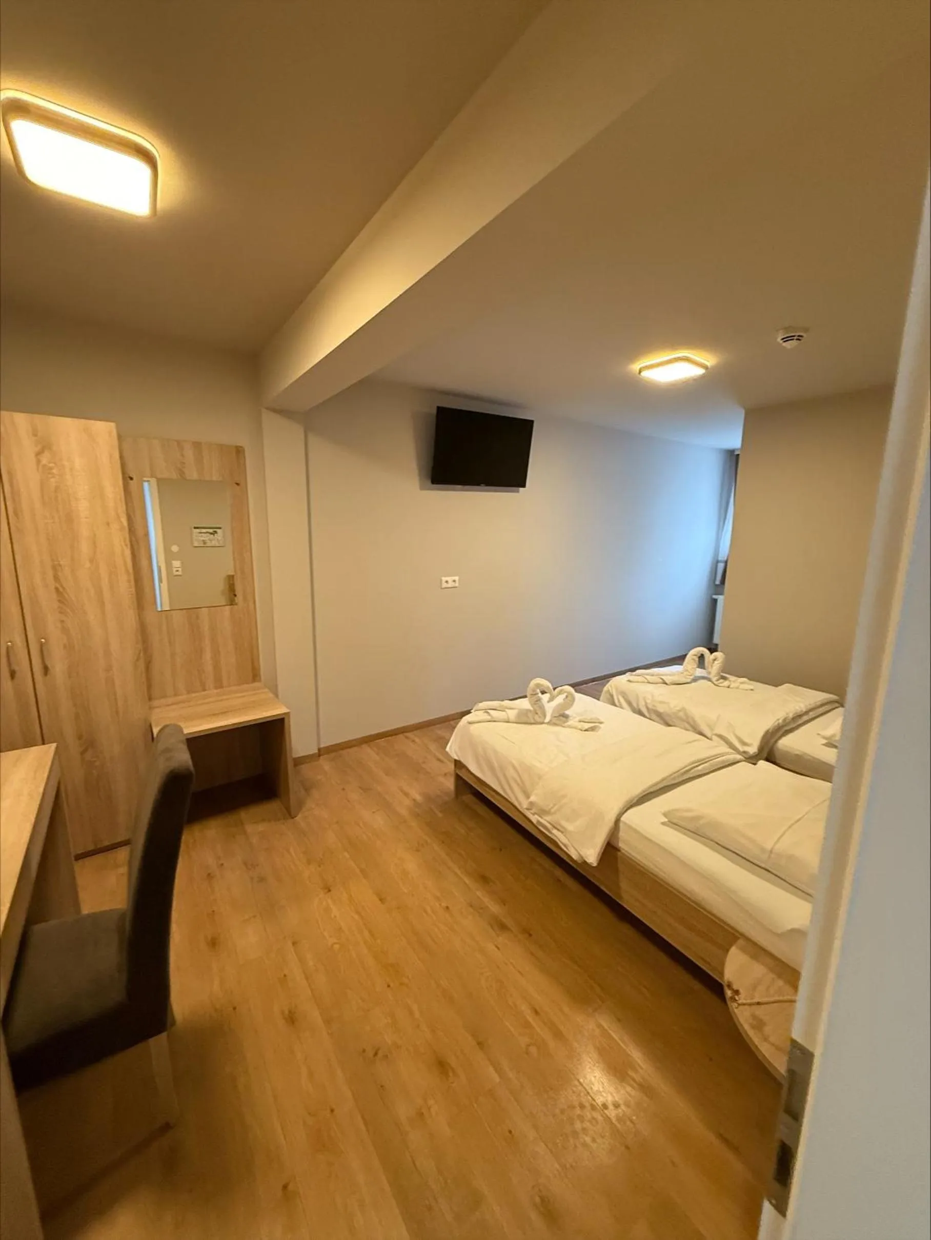 Bed in Pension Villa Colosseo im Herzen von Meiningen