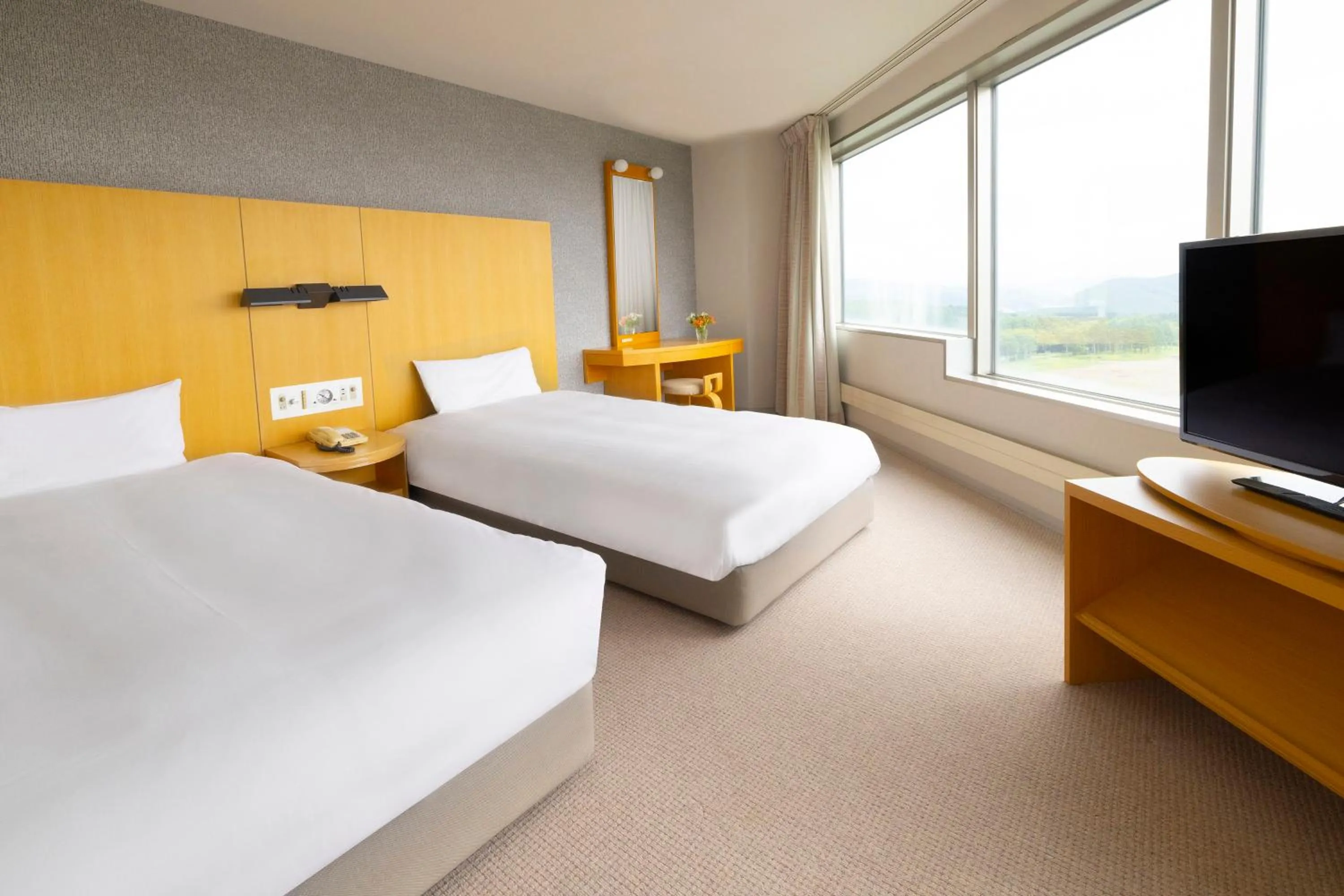 Photo of the whole room, Bed in ANA Crowne Plaza Resort Appi Kogen by IHG