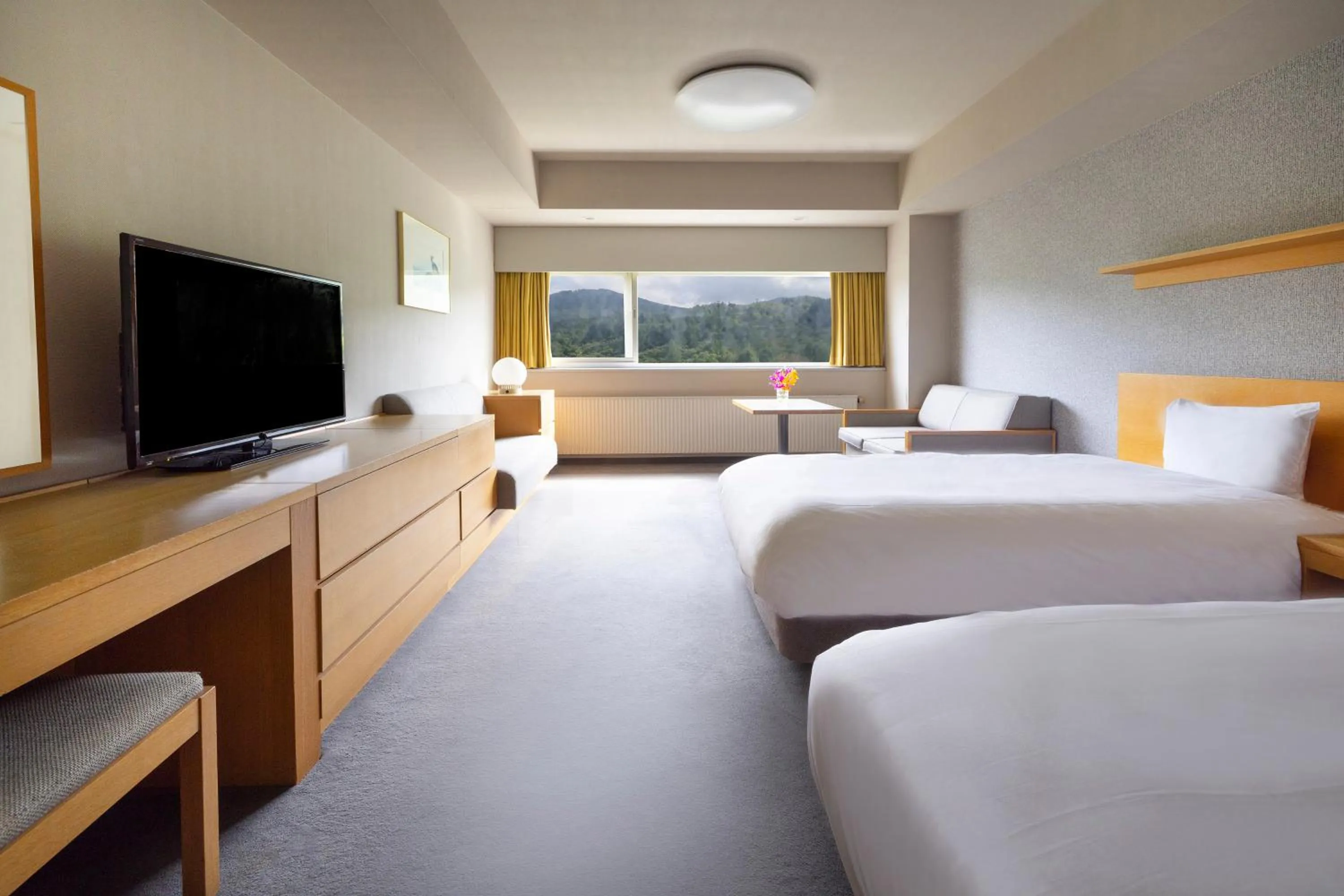 Photo of the whole room, Bed in ANA Crowne Plaza Resort Appi Kogen by IHG