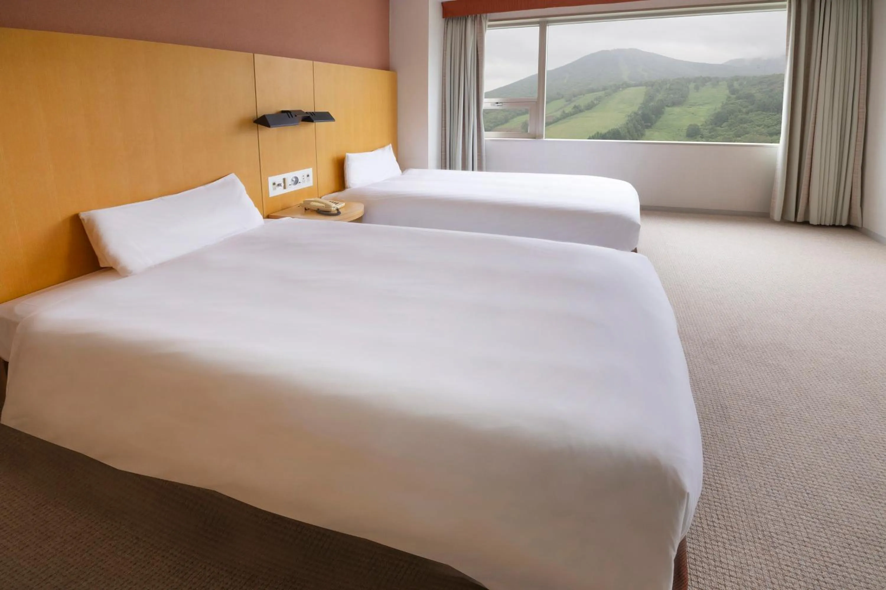 Photo of the whole room, Bed in ANA Crowne Plaza Resort Appi Kogen by IHG