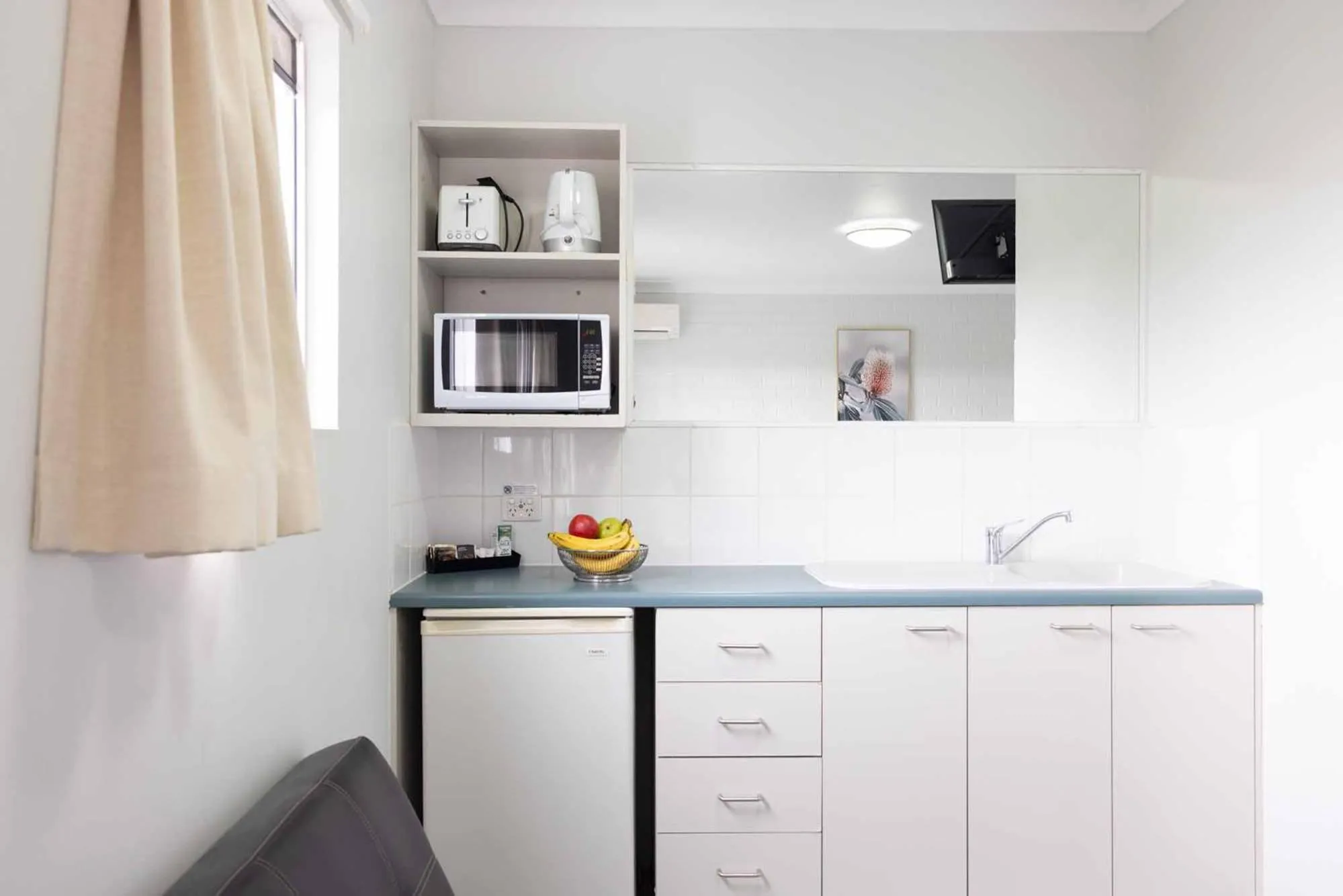 Kitchen or kitchenette in Herston Place Motel