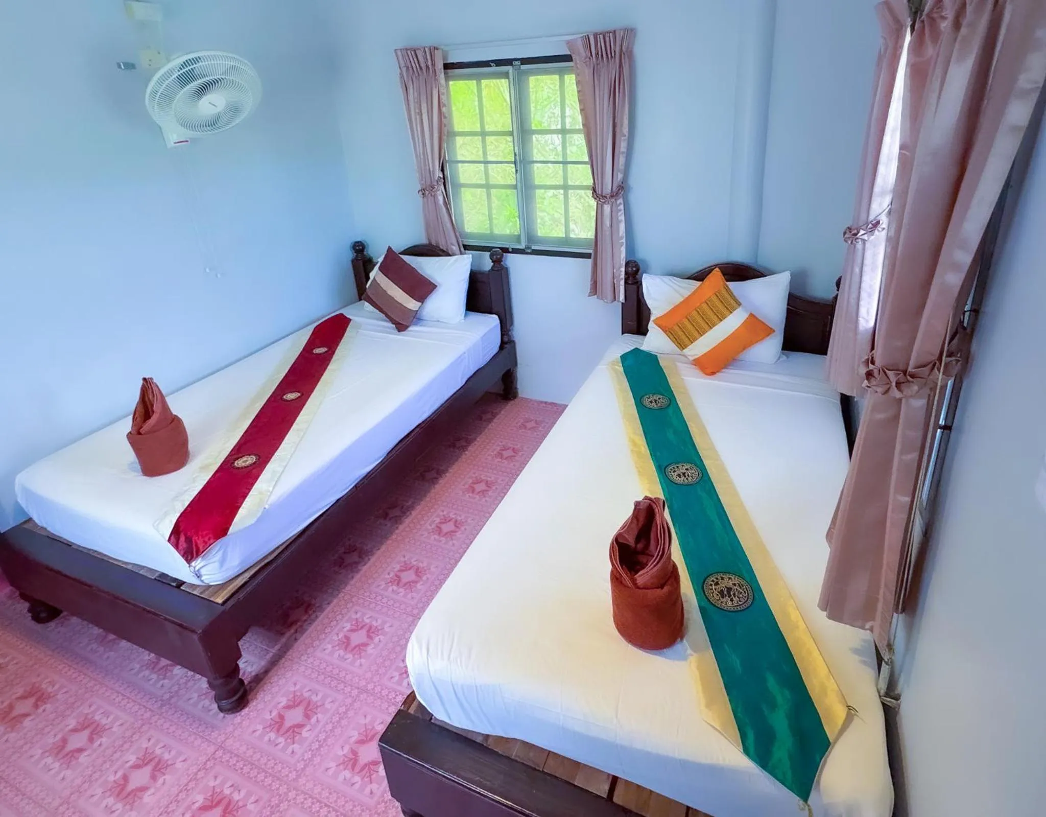 Bed in JP Resort Koh Tao