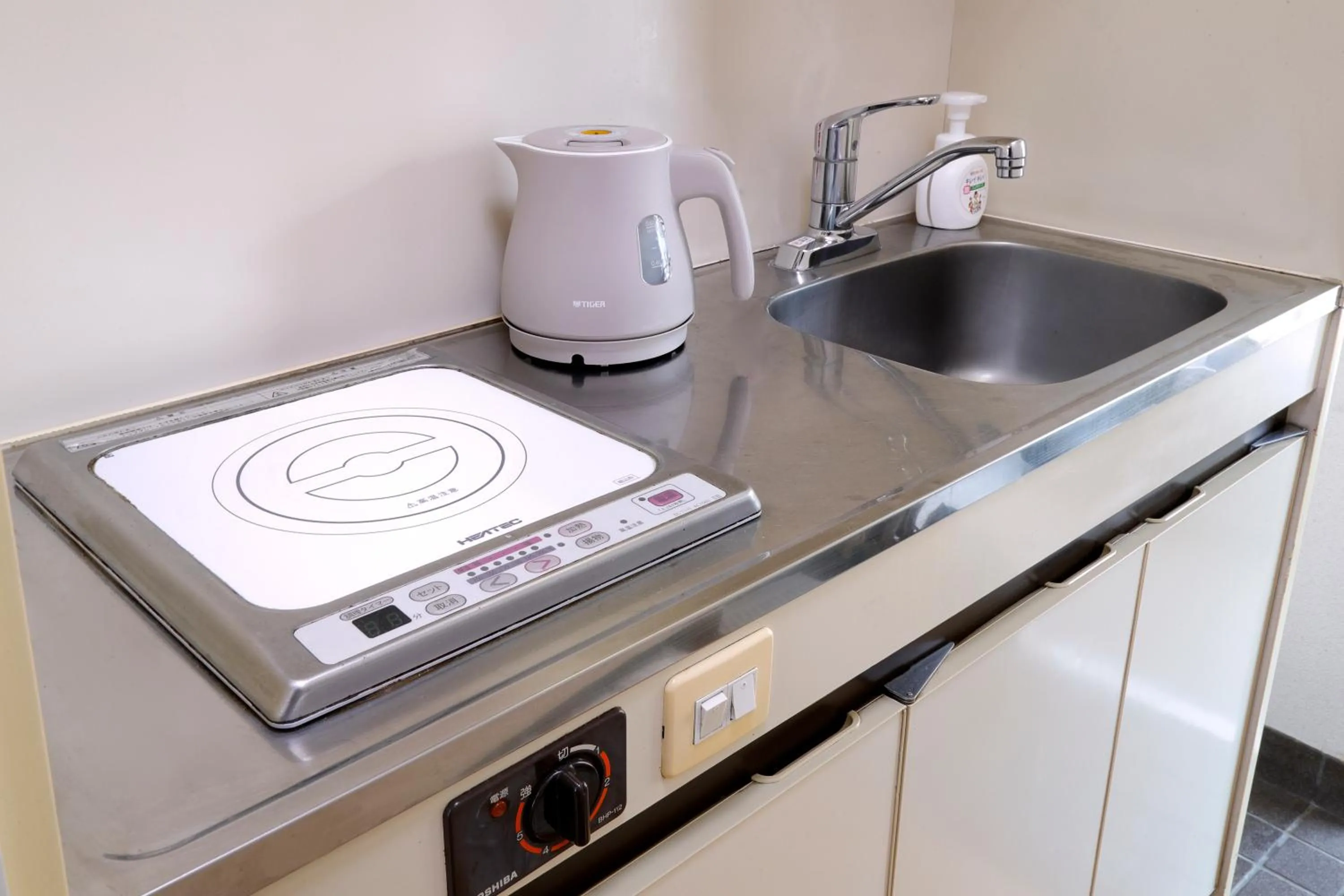 kitchen in ホテル西川口ウィークリー