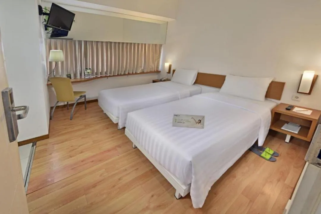 Bedroom, Bed in Whiz Hotel Pemuda Semarang