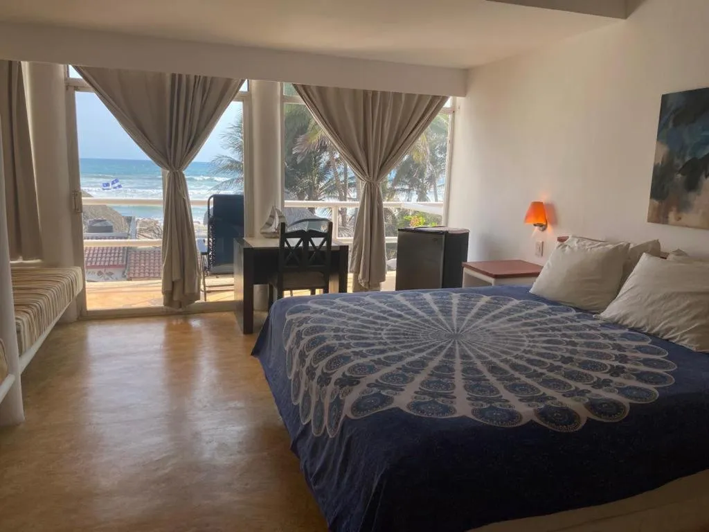 Bed in Casa de las Olas Surf & Beach Club