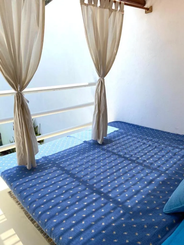 Bed in Casa de las Olas Surf & Beach Club