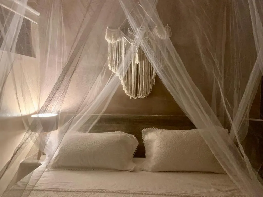 Bed in Casa de las Olas Surf & Beach Club