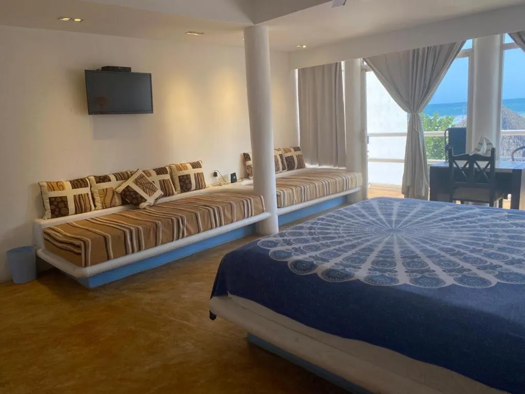 Bed in Casa de las Olas Surf & Beach Club